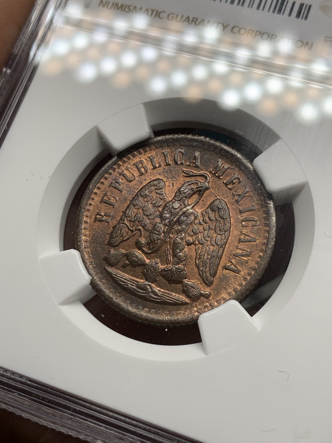 《竞宝斋》第34，35场-本周日，周一2场连拍（全场顺丰包邮） NGC MS64RB 1897年墨西哥铜鹰洋好品这个年份这个品相难得