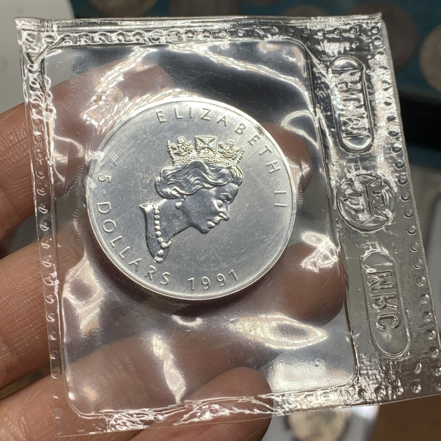 《竞宝斋》第34，35场-本周日，周一2场连拍（全场顺丰包邮） 原封装 加拿大1991年 伊丽莎白二世 枫叶一元 1盎司纯银9999 银币