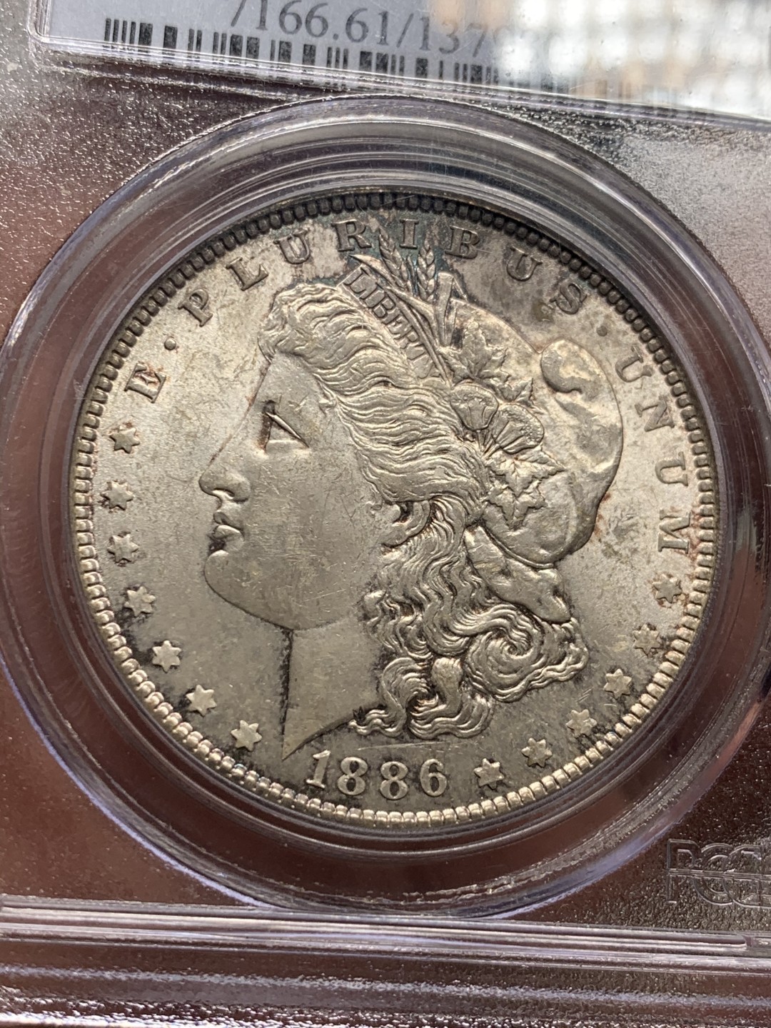 《竞宝斋》第34，35场-本周日，周一2场连拍（全场顺丰包邮） PCGS-MS61 美国 1886 年 摩根银币 不多的年份，老盒低评 淡彩包浆