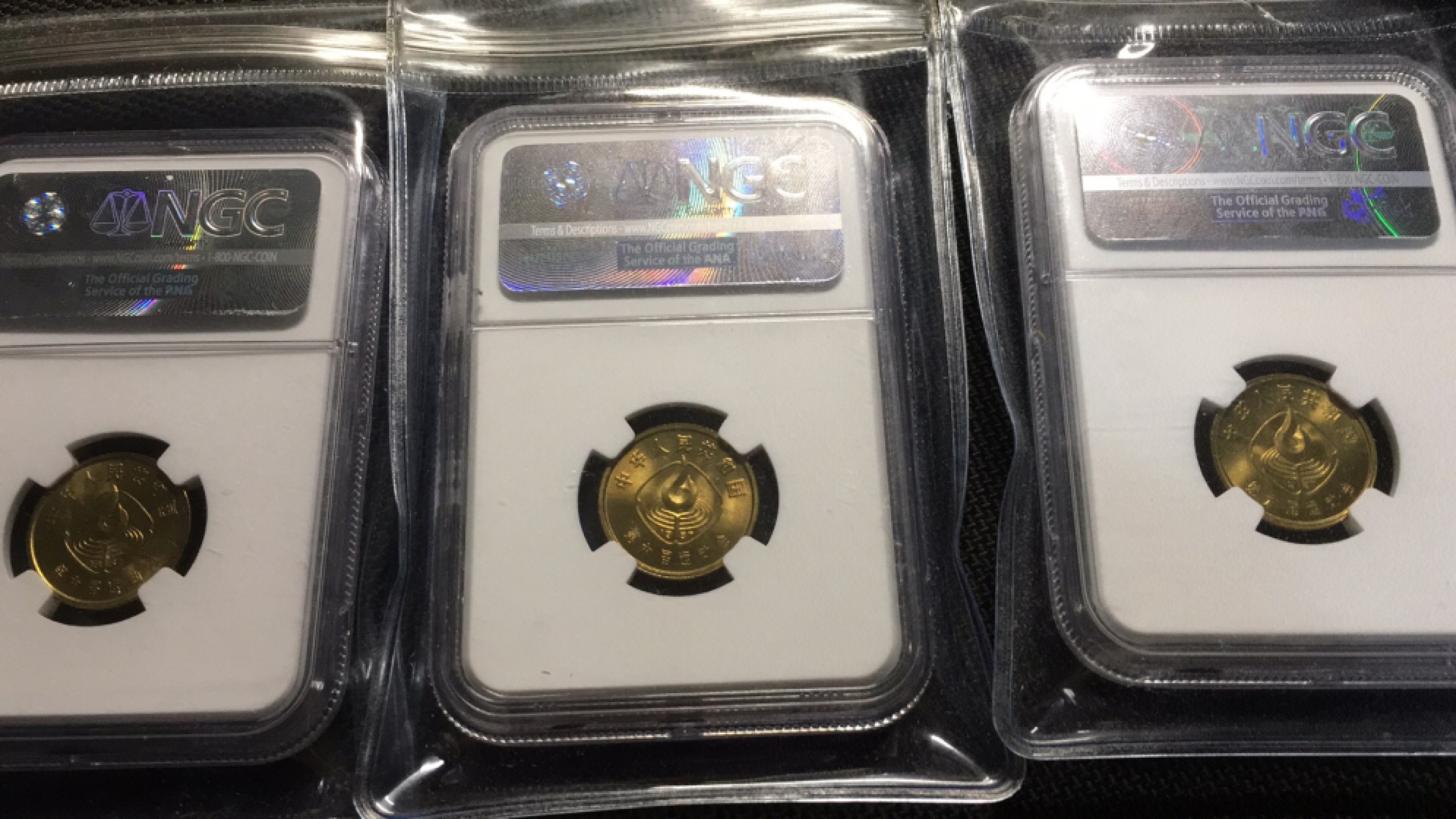 【华誉王者】1921期拍卖 第六届运动会 纪念币三枚 NGC-MS66