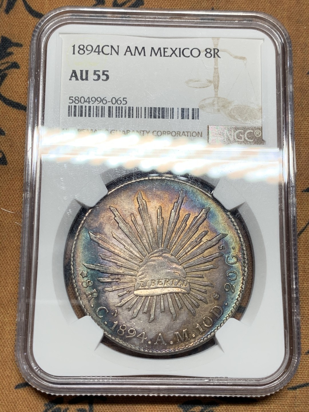 《竞宝斋》第34，35场-本周日，周一2场连拍（全场顺丰包邮） NGC-AU55 墨西哥 1894 花边鹰洋 原味带光五彩 极品五彩包浆