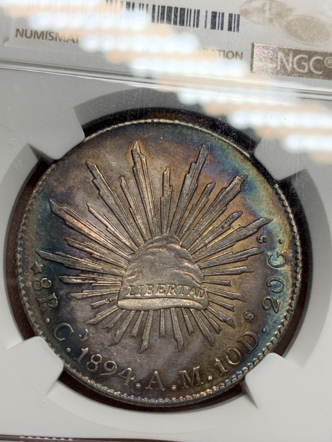 《竞宝斋》第34，35场-本周日，周一2场连拍（全场顺丰包邮） NGC-AU55 墨西哥 1894 花边鹰洋 原味带光五彩 极品五彩包浆