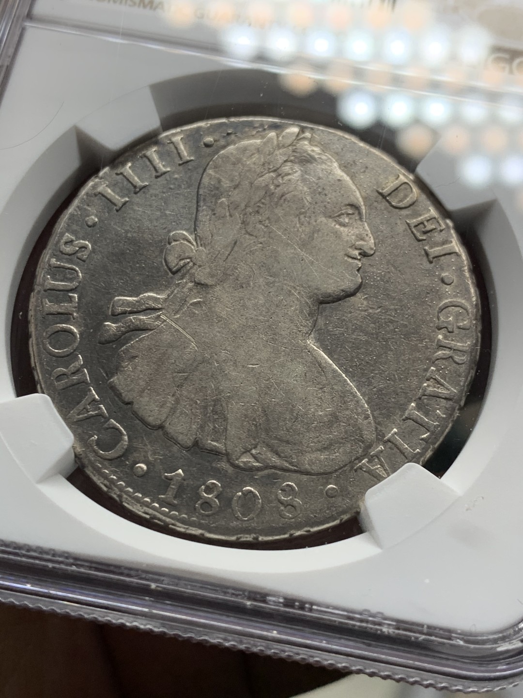 《竞宝斋》第34，35场-本周日，周一2场连拍（全场顺丰包邮） NGC 评级 玻利维亚 1808年 卡四 8里亚尔 双柱银币