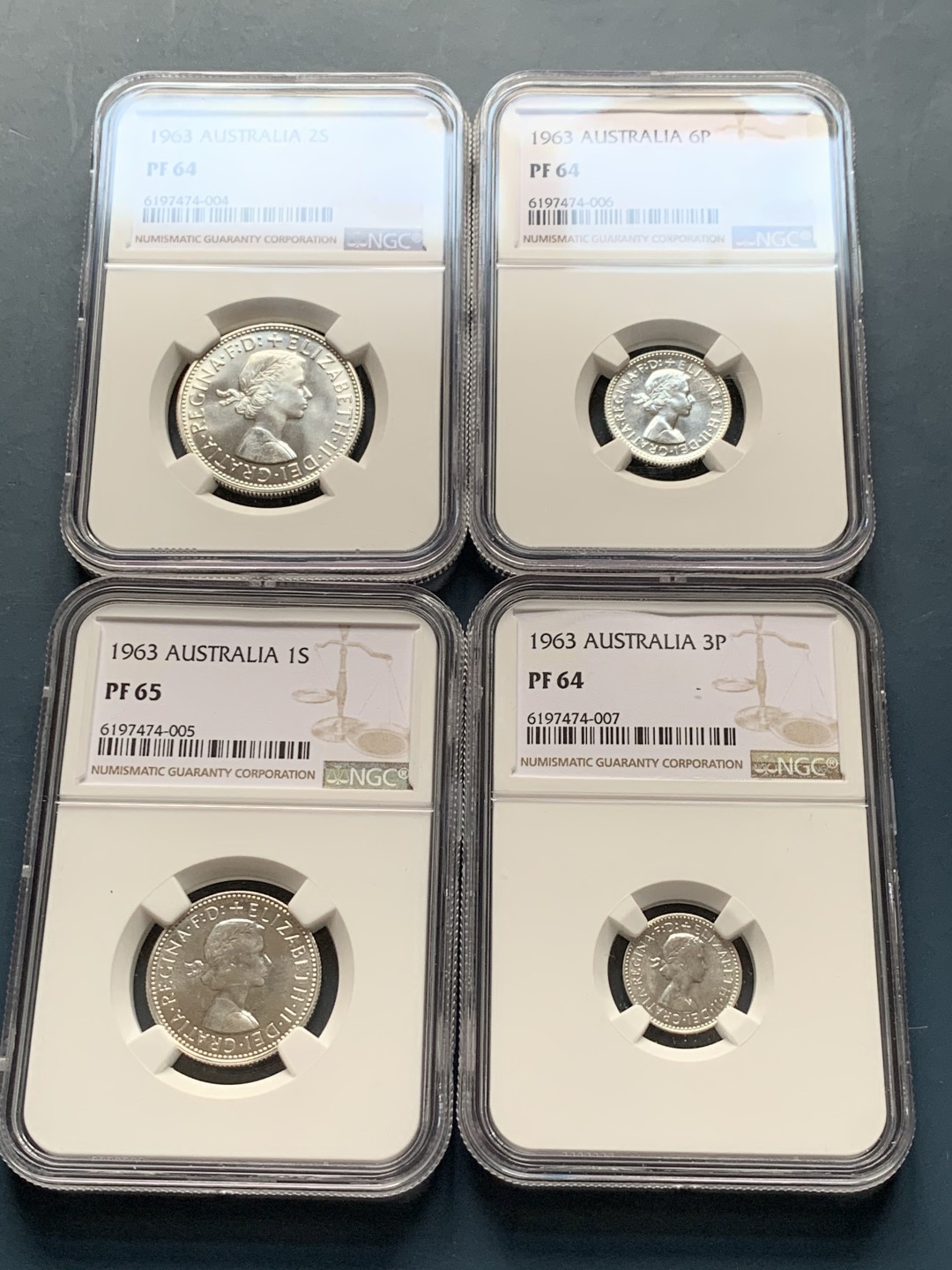 《竞宝斋》第34，35场-本周日，周一2场连拍（全场顺丰包邮） 澳大利亚 1963年 4枚银便士精制套币 早期少见十二进制的精制套币，书价375刀