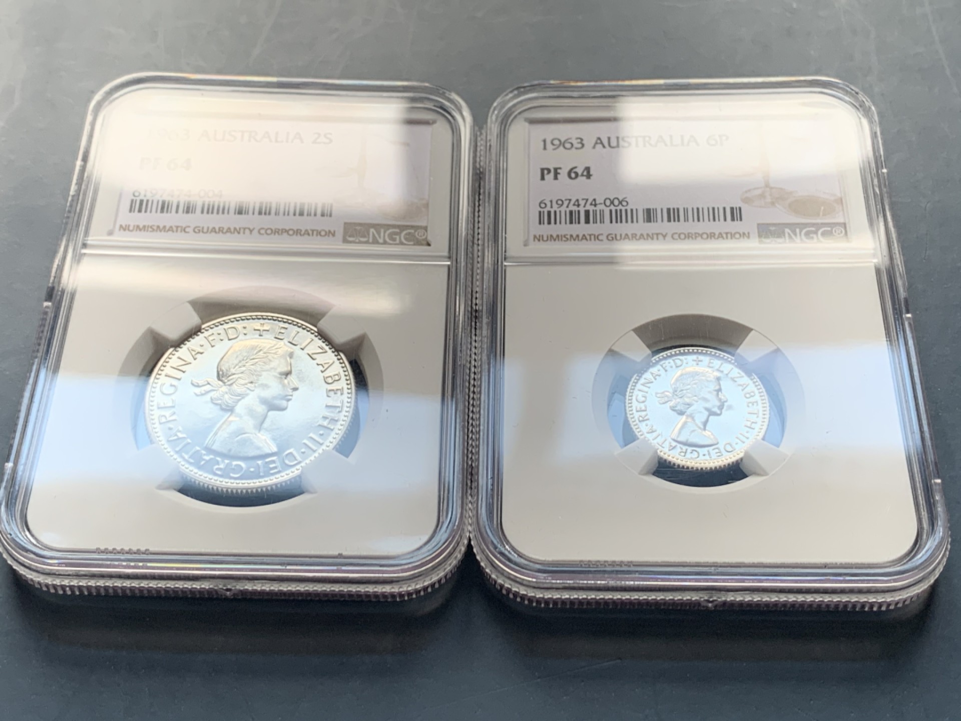 《竞宝斋》第34，35场-本周日，周一2场连拍（全场顺丰包邮） 澳大利亚 1963年 4枚银便士精制套币 早期少见十二进制的精制套币，书价375刀