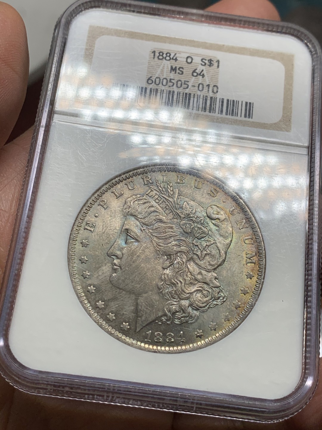 《竞宝斋》第36场-本周日 （全场顺丰包邮） NGC-MS64美国1884年摩根银币 NGC老盒严评，淡五彩包浆