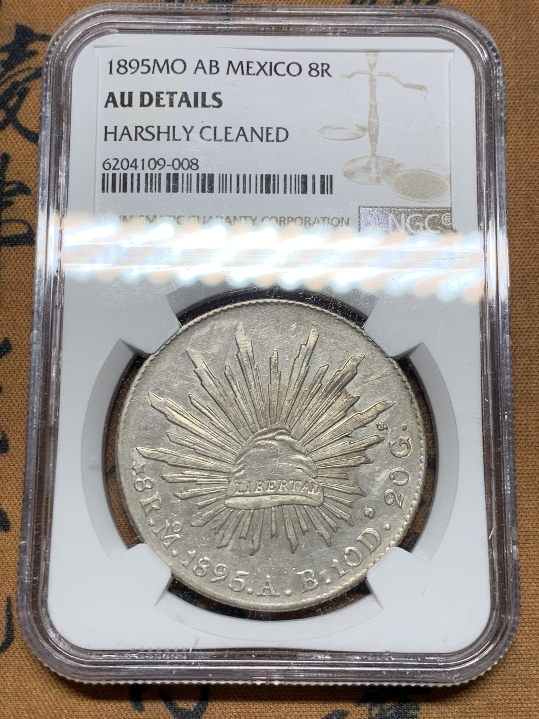 《竞宝斋》第36场-本周日 （全场顺丰包邮） NGC-AUD   墨西哥 1895年 8 里亚尔   墨西哥厂  银币     原味mo厂老鹰 