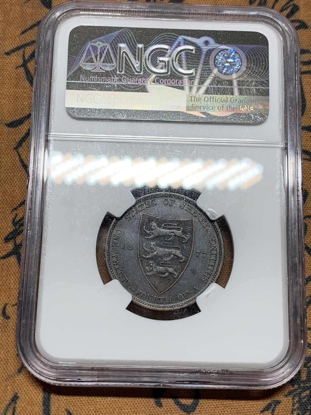 《竞宝斋》第36场-本周日 （全场顺丰包邮） AUDETAILS 英属泽西 1877年H 1/24先令 纯黑巧克力包浆好味道！