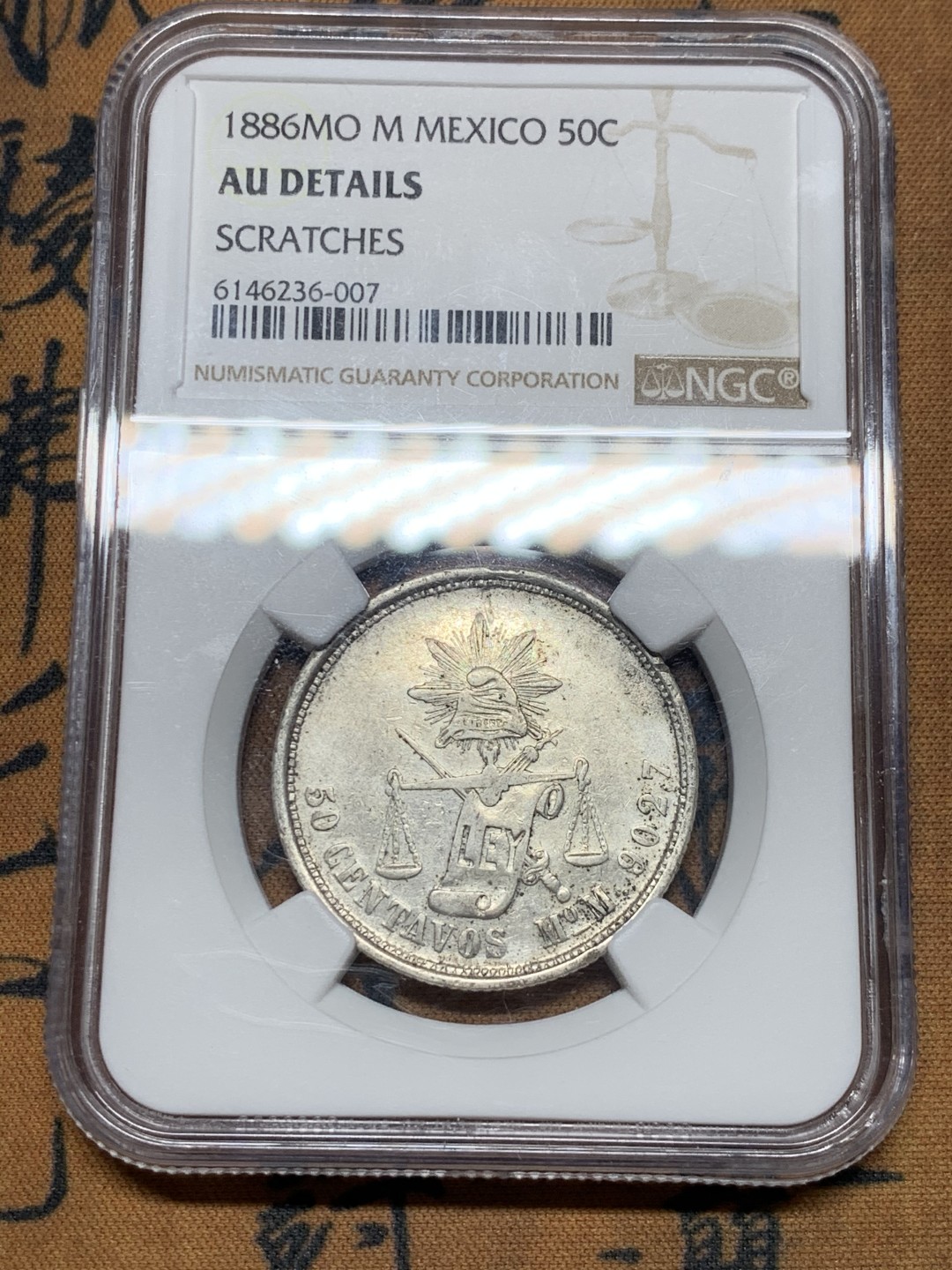 《竞宝斋》第36场-本周日 （全场顺丰包邮） NGC-AUD   墨西哥天平鹰洋半圆  1886年  墨西哥城造币厂 银币原味