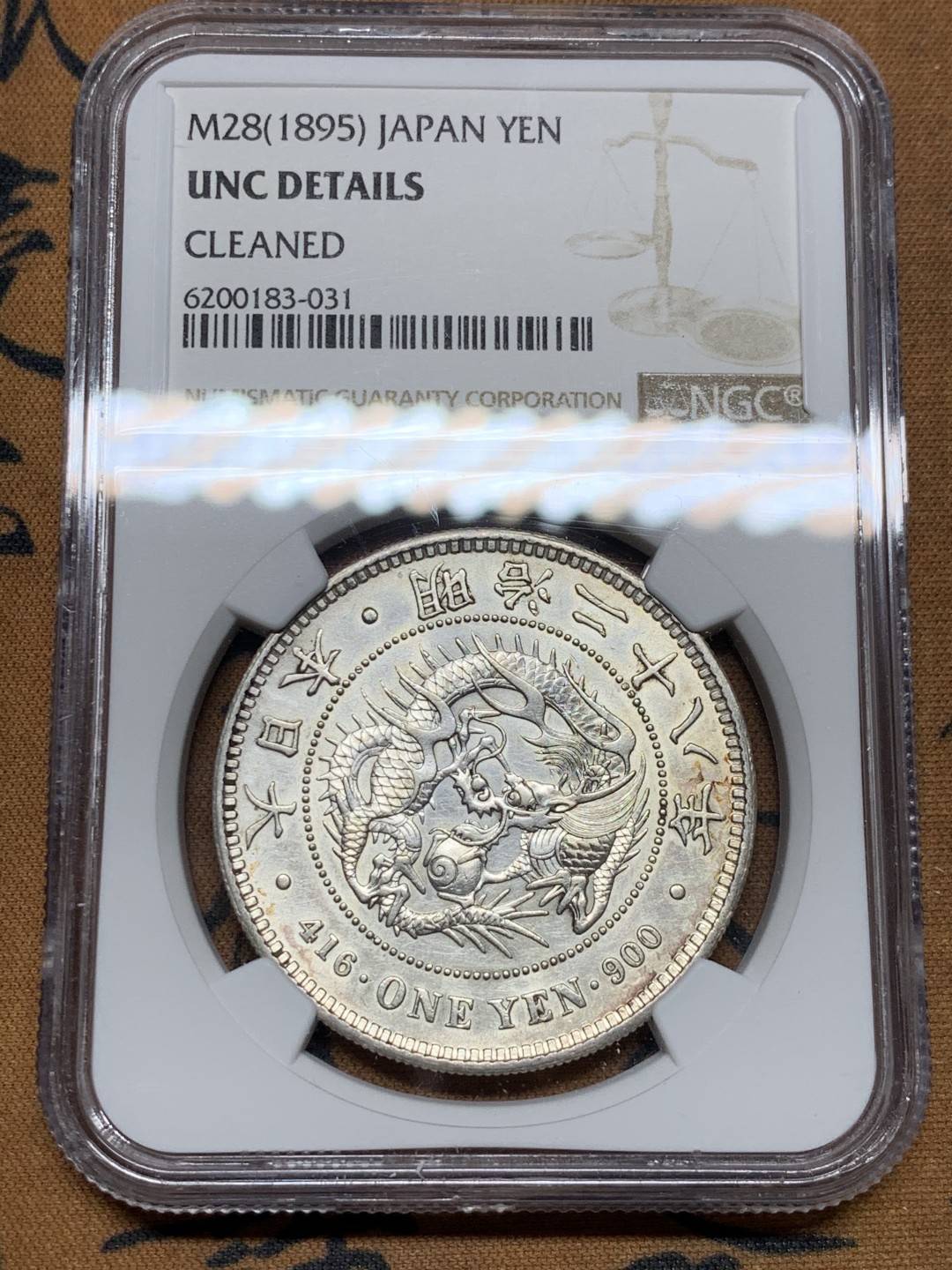 《竞宝斋》第36场-本周日 （全场顺丰包邮） NGC-UNCD  日本龙洋 明治28年（1895）一元 银币 早期年份   小年份