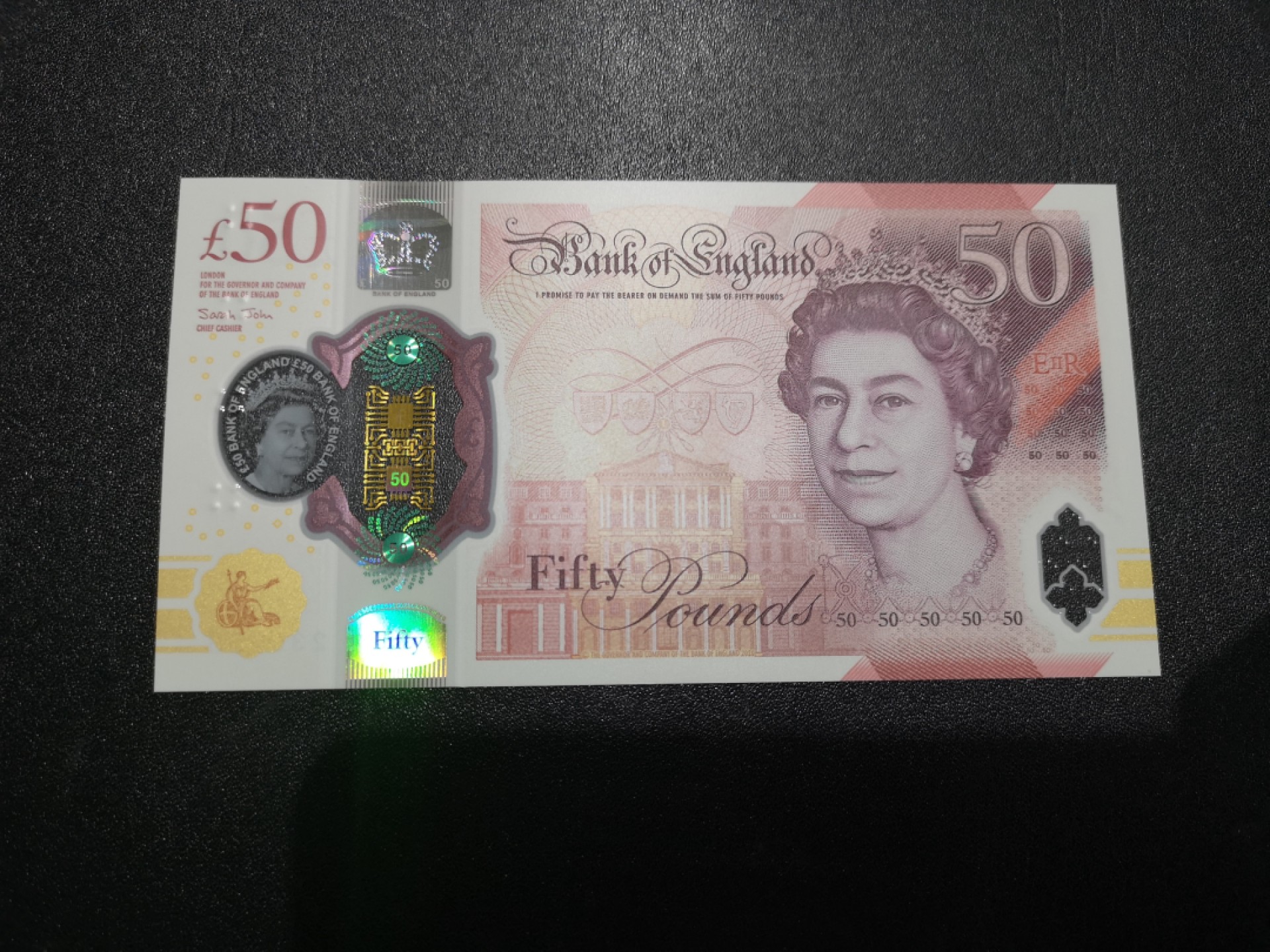 《外钞收藏家》第一百六十九期拍卖（本期65件） 英国最新版50镑塑料钞 AA01首发冠 全新UNC 无47