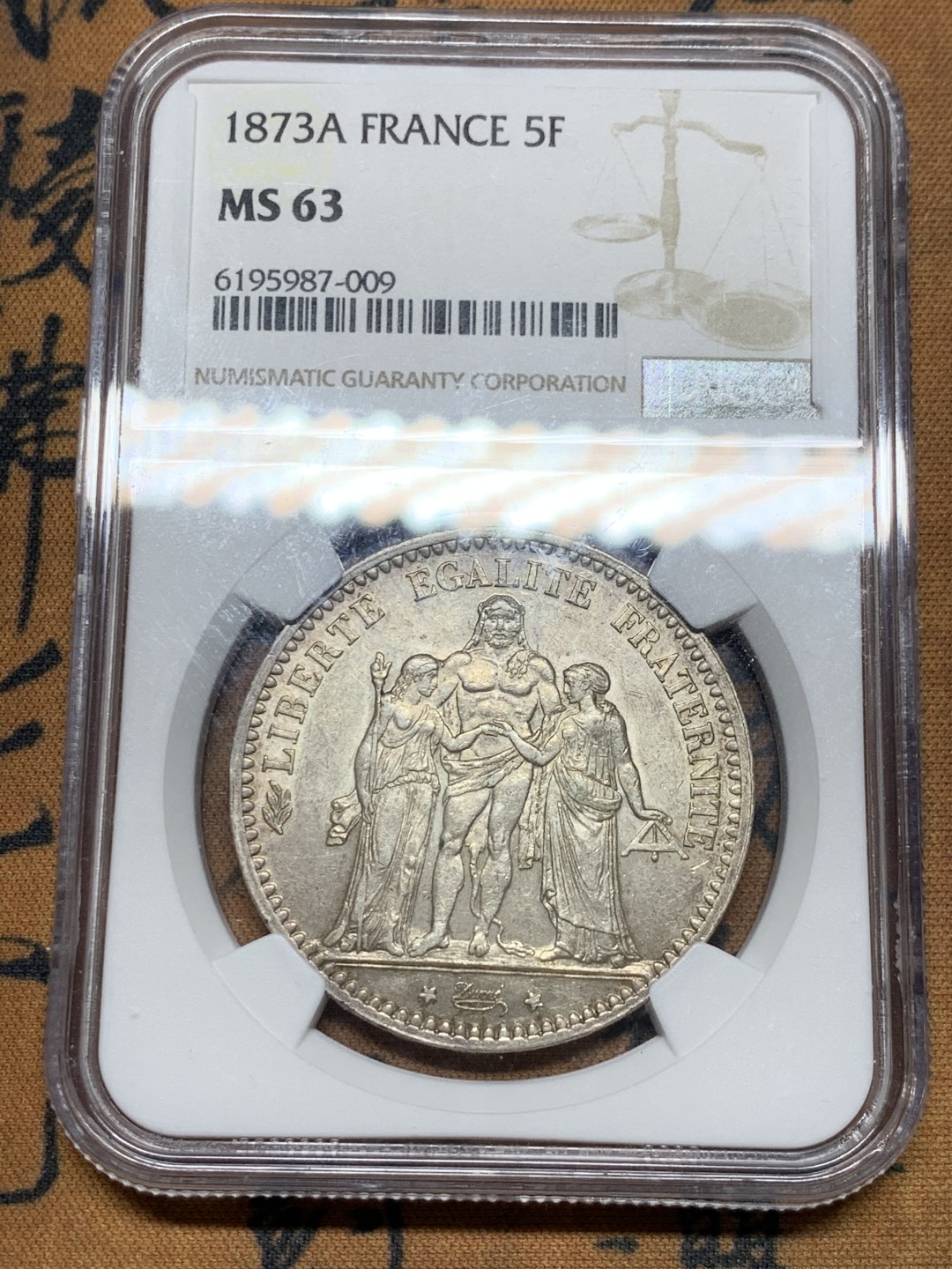 《竞宝斋》第36场-本周日 （全场顺丰包邮） NGC-MS63 法国大力神1873年A版 5法郎 原生态淡粉光包浆，高点聚在 脸部清晰 