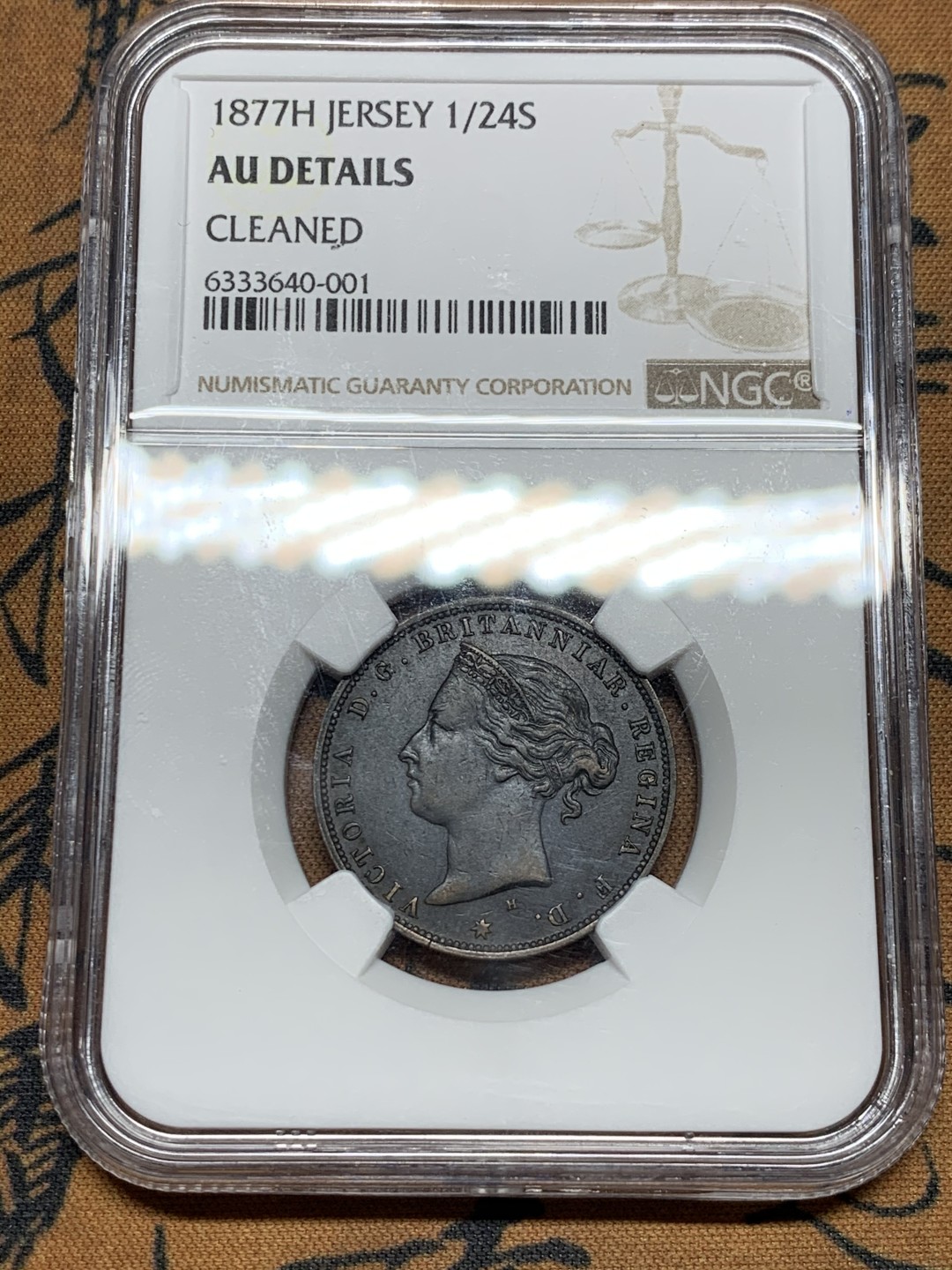 《竞宝斋》第36场-本周日 （全场顺丰包邮） AUDETAILS 英属泽西 1877年H 1/24先令 纯黑巧克力包浆好味道！