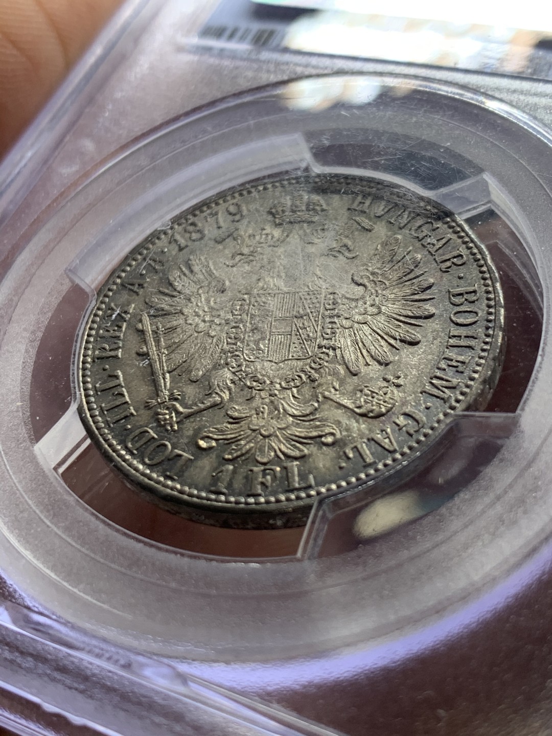 《竞宝斋》第36场-本周日 （全场顺丰包邮） PCGS-MS65 奥地利 1879年 1弗洛林银币 顶级高分 转光五彩