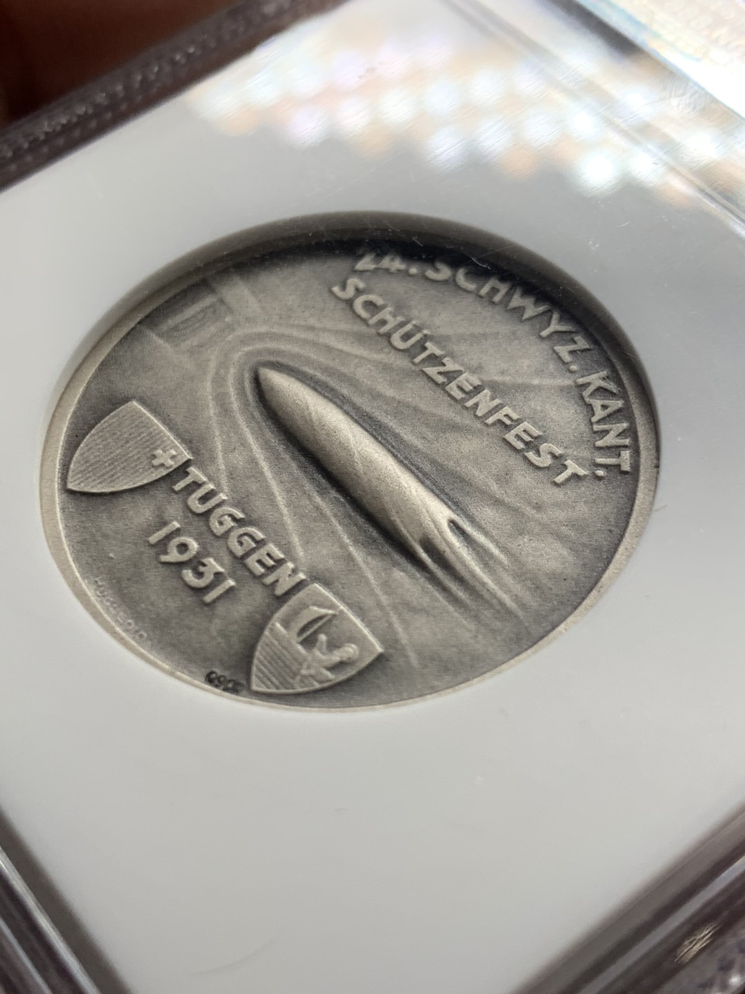 《竞宝斋》第36场-本周日 （全场顺丰包邮） NGC-MS67 瑞士 1931年施维茨-图根射击节银章 让子弹飞 唯一冠军分 存世量个位数 表面有冰霜实物极其养眼 顶级藏品 外拍大热门