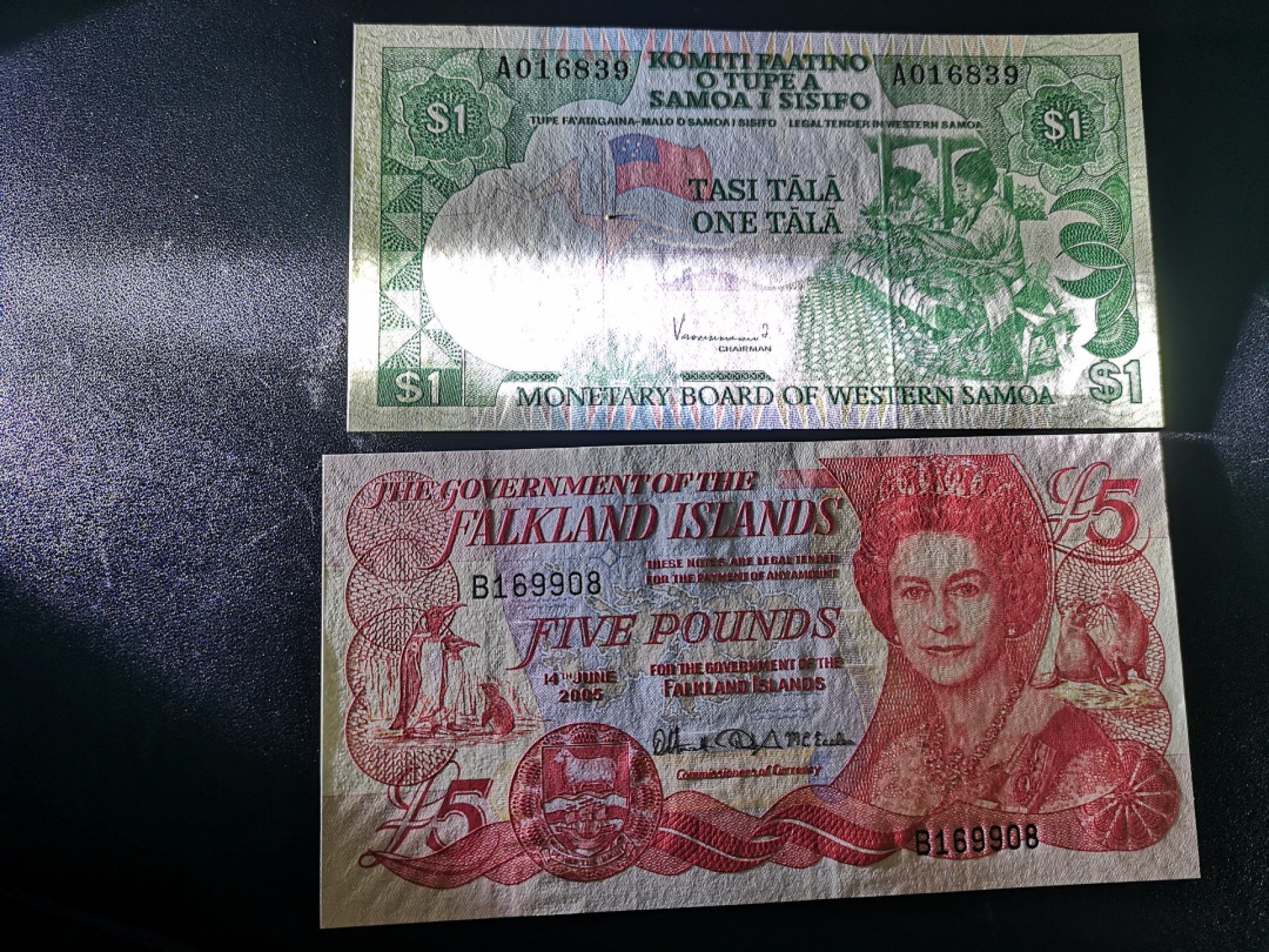 《外钞收藏家》第一百六十九期拍卖（本期65件） 福克兰群岛和萨摩亚各一张 全新UNC 无47