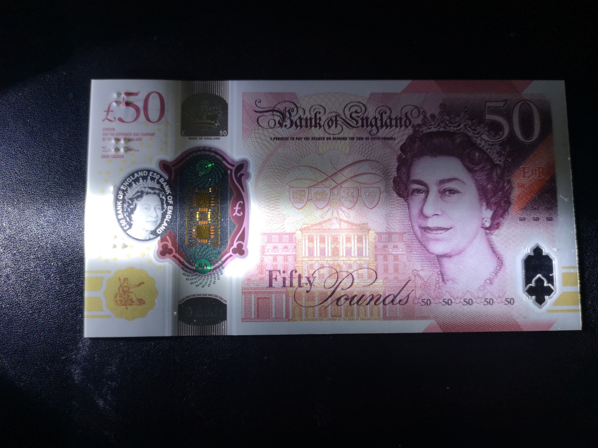 《外钞收藏家》第一百六十九期拍卖（本期65件） 英国最新版50镑塑料钞 AA01首发冠 全新UNC 无47