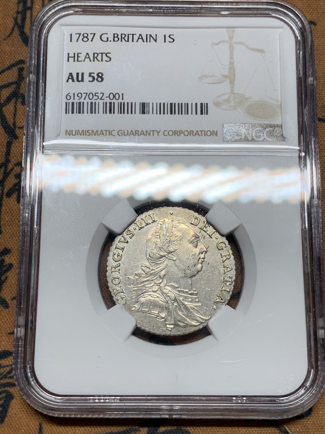 《竞宝斋》第36场-本周日 （全场顺丰包邮） NGC-AU58 英国1787乔治三世一先令有心版 早期军装头像