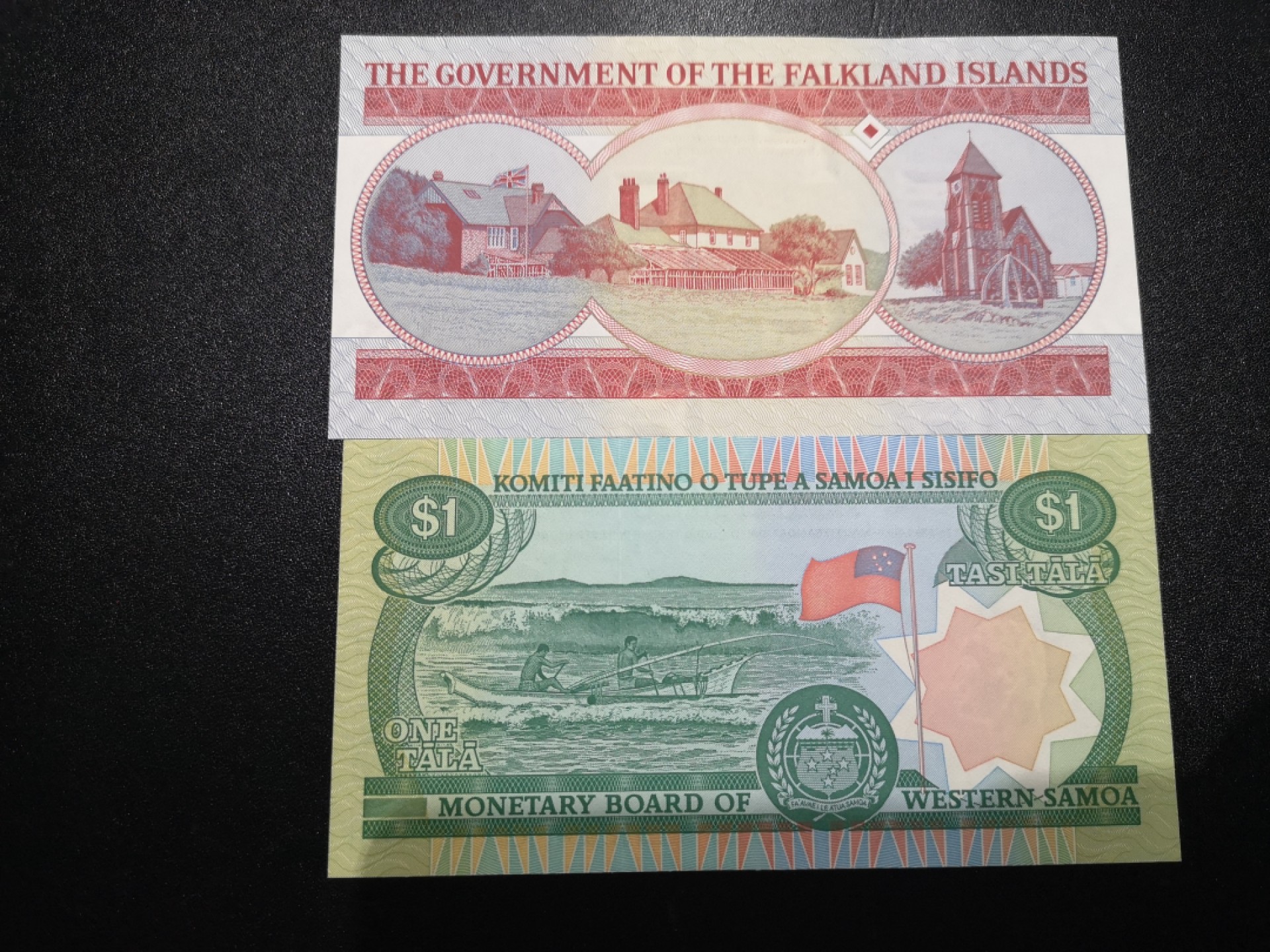 《外钞收藏家》第一百六十九期拍卖（本期65件） 福克兰群岛和萨摩亚各一张 全新UNC 无47