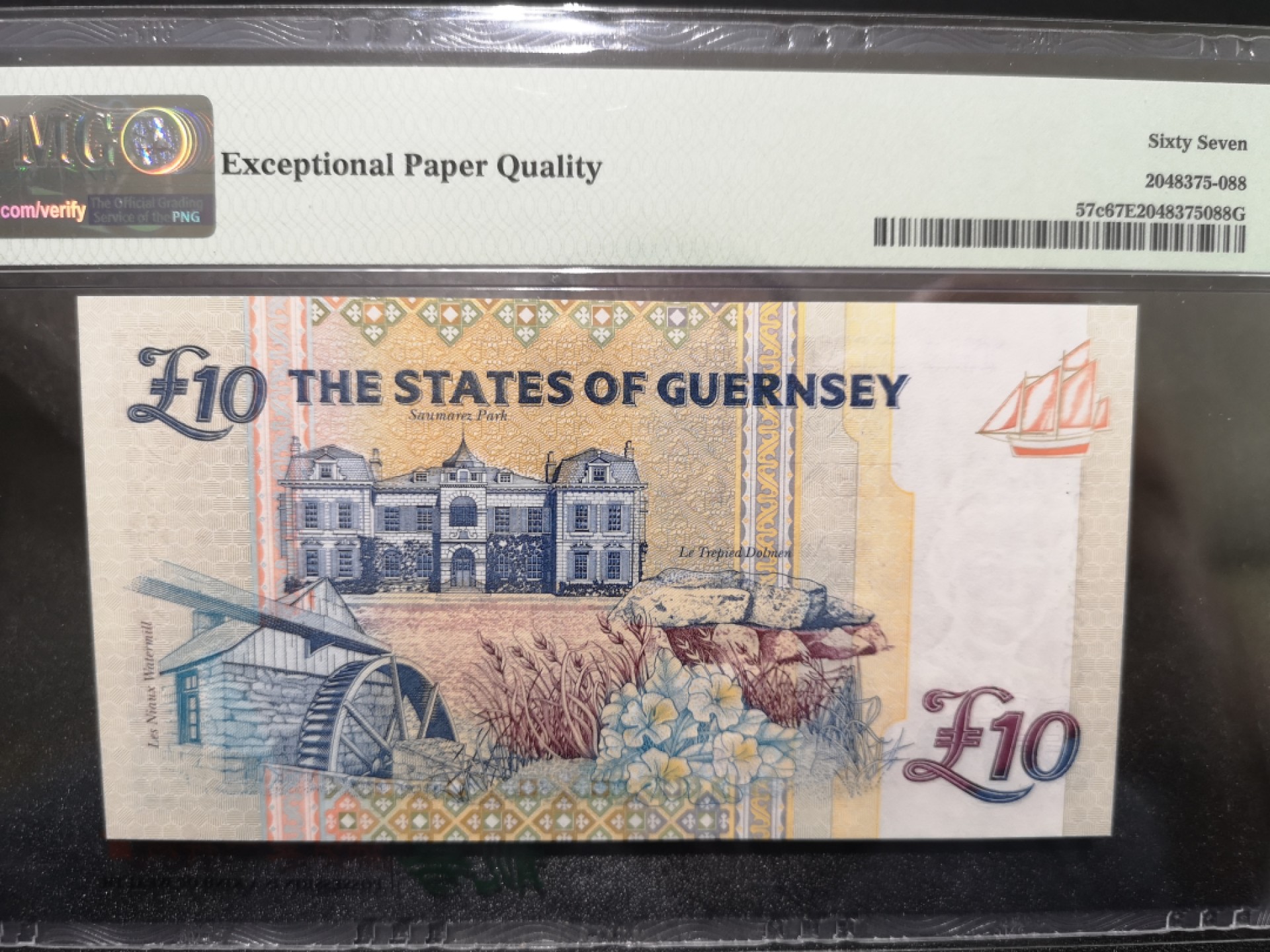 《外钞收藏家》第一百六十九期拍卖（本期65件） 1995年格恩西10镑 PMG67 无47百位号