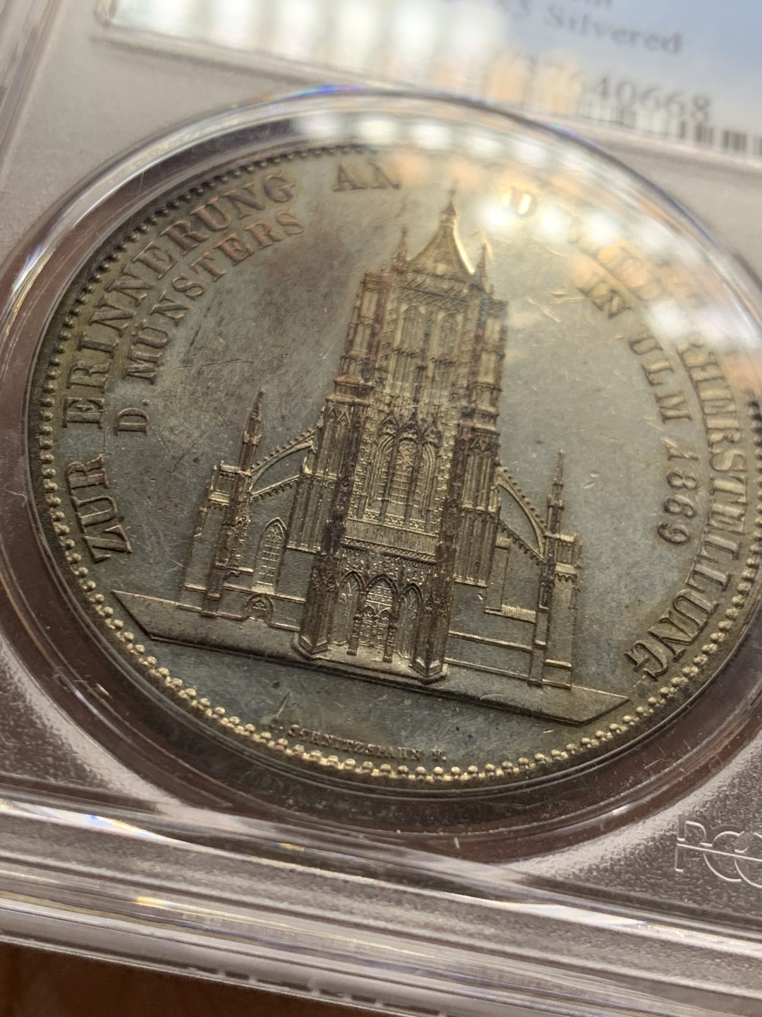 《竞宝斋》第36场-本周日 （全场顺丰包邮） pcgs-sp62 1923年德国镀银样章 乌尔姆大教堂 状态不错 跟大涨的乌尔姆教堂泰勒一脉相承 细节令人惊叹 雕刻精细 典型的哥特式建筑 高度世界第一 从设计到建成经历了近600年人世沧桑 