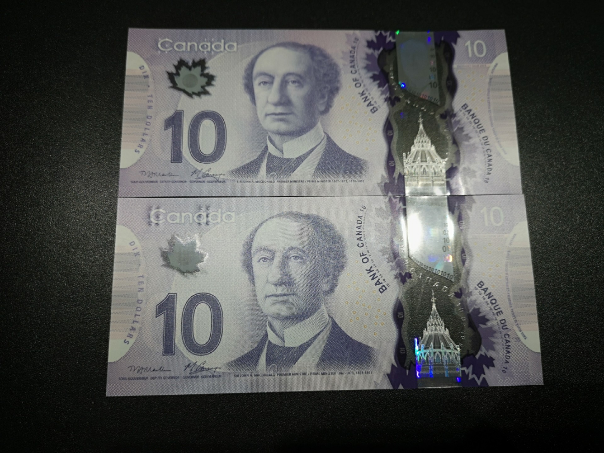 《外钞收藏家》第一百六十九期拍卖（本期65件） 2013年加拿大10加元 首发冠FEW两连号 全新UNC