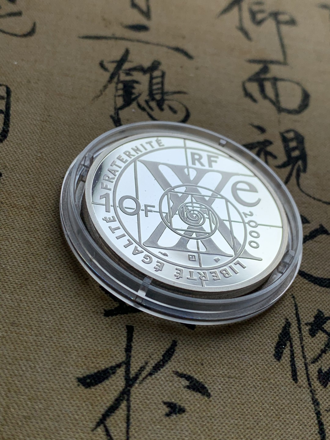 《竞宝斋》第37场-周日 首场自动拍卖 2件或者满200包顺丰 原蓝盒证书法国2000年 飞行中的伊卡洛斯 10法郎精制大银币