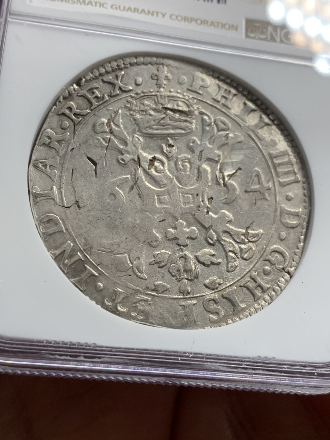《竞宝斋》第37场-周日 首场自动拍卖 2件或者满200包顺丰 NGC评级 西属尼德兰-布拉邦特公国 1654年 1潘塔贡大银币 菲利普四世  此品种大多应用于应付尼德兰地区军饷支付，普遍存在各种缺陷