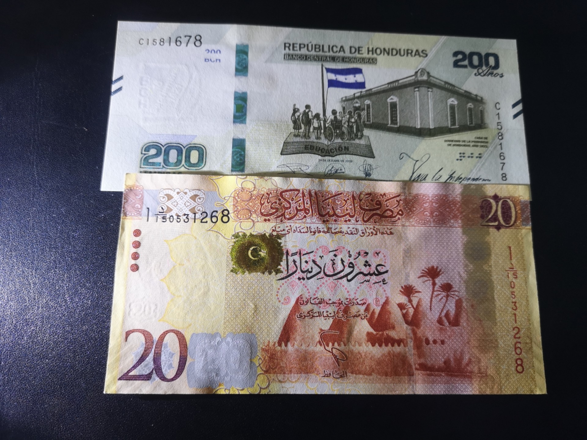 《外钞收藏家》第一百七十期拍卖（本期59件） 2021年洪都拉斯200全新UNC和利比亚20全新角不绝