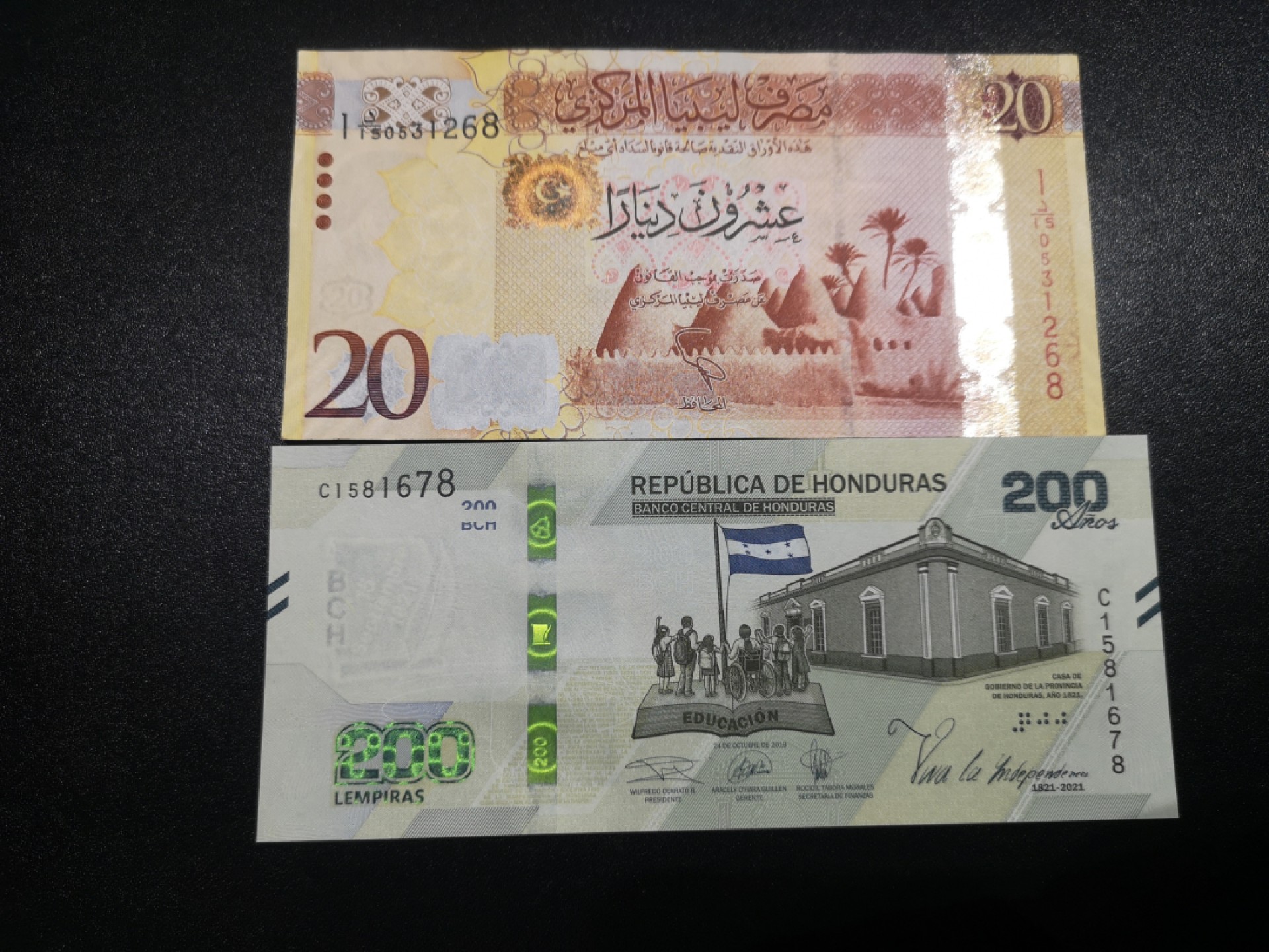 《外钞收藏家》第一百七十期拍卖（本期59件） 2021年洪都拉斯200全新UNC和利比亚20全新角不绝