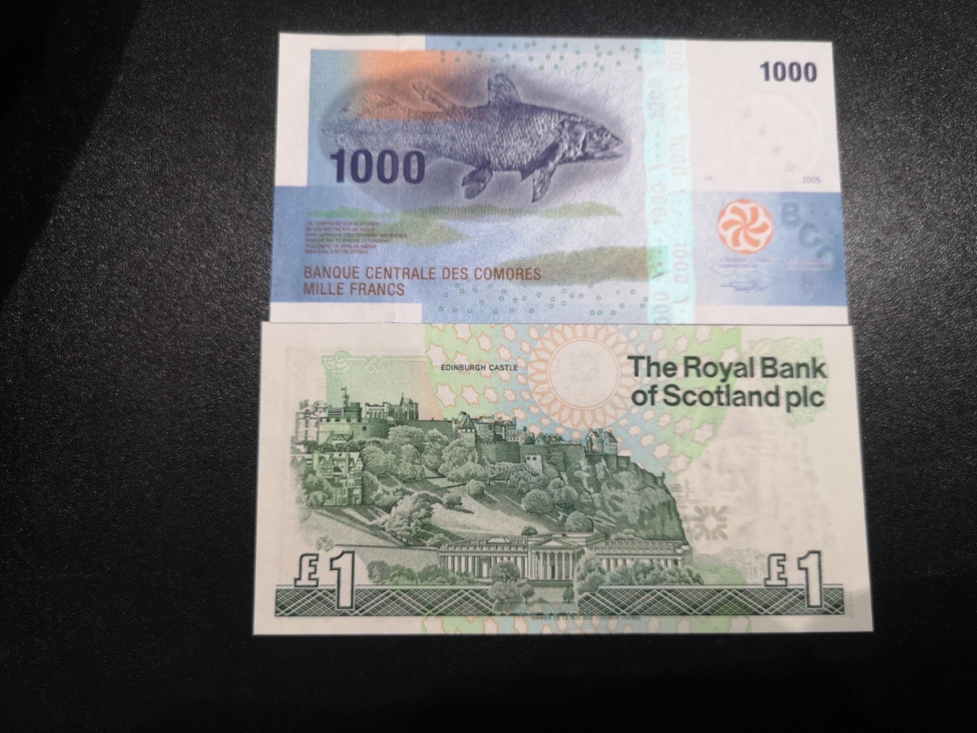 《外钞收藏家》第一百七十期拍卖（本期59件） 1992年苏格兰1镑和科摩罗1000法郎 两张全新UNC