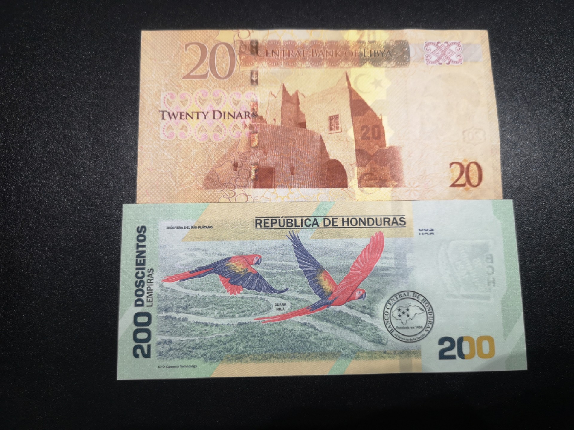 《外钞收藏家》第一百七十期拍卖（本期59件） 2021年洪都拉斯200全新UNC和利比亚20全新角不绝