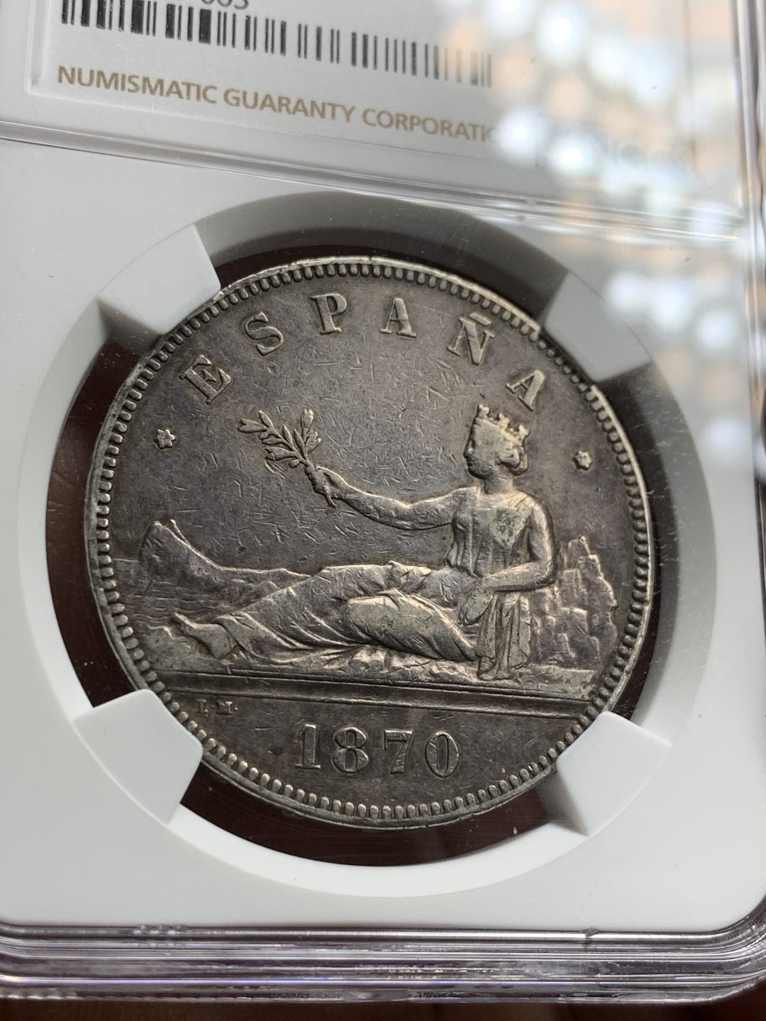 《竞宝斋》第38场-本周一 （全场顺丰包邮） NGC- XFDETAILS 西班牙 1870年 5比塞塔 拿花双柱 大银币 原味黑包浆！