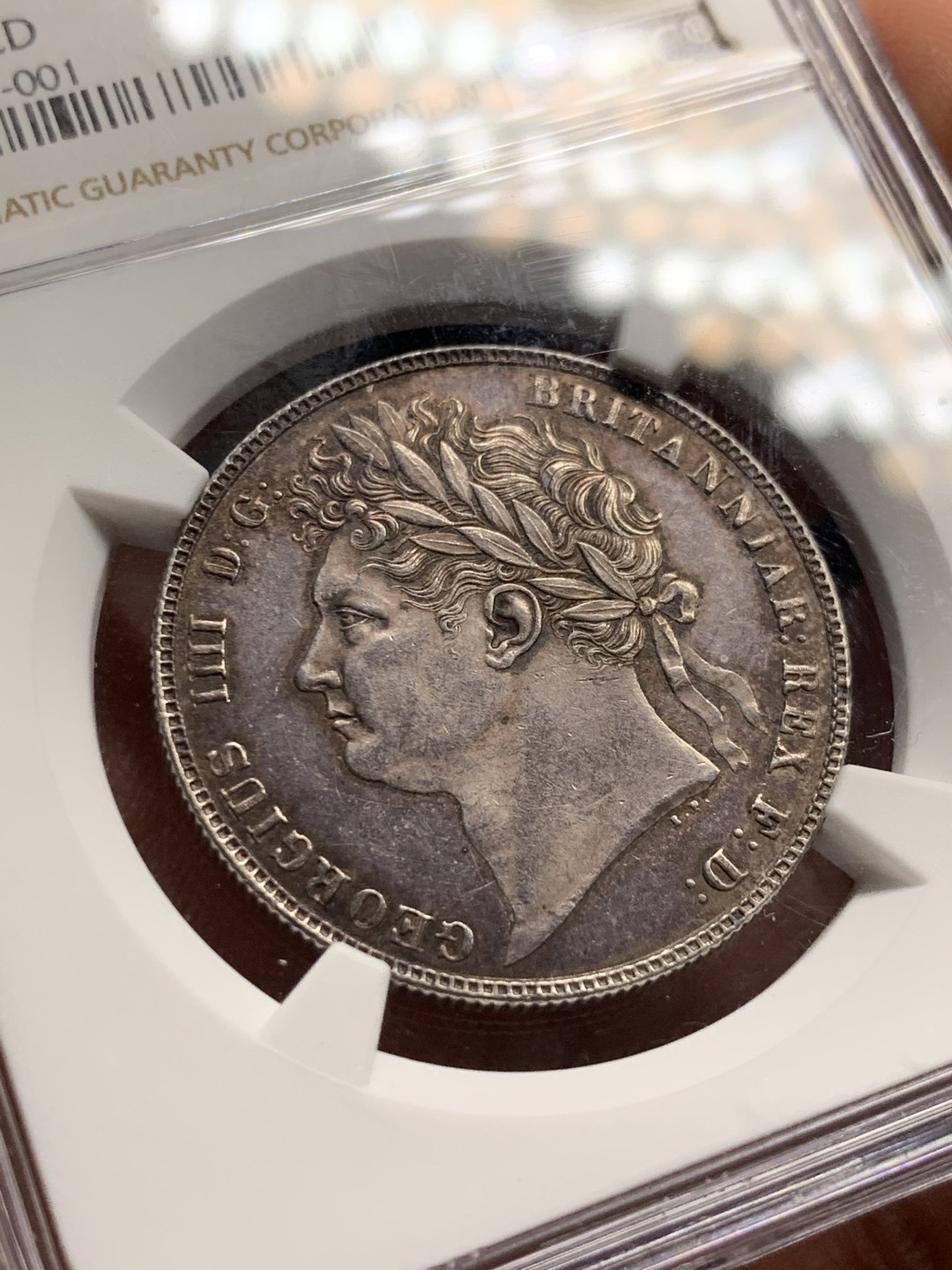 《竞宝斋》第38场-本周一 （全场顺丰包邮） 1820年 NGC UNC英国1820乔治四世半克朗银币，三花版，紫罗兰包浆 不是常见的1821，细节完美