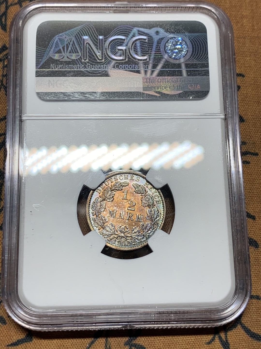 《竞宝斋》第38场-本周一 （全场顺丰包邮） NGC-MS61 德国 1916年 1/2马克 银币  双面五彩重彩包浆