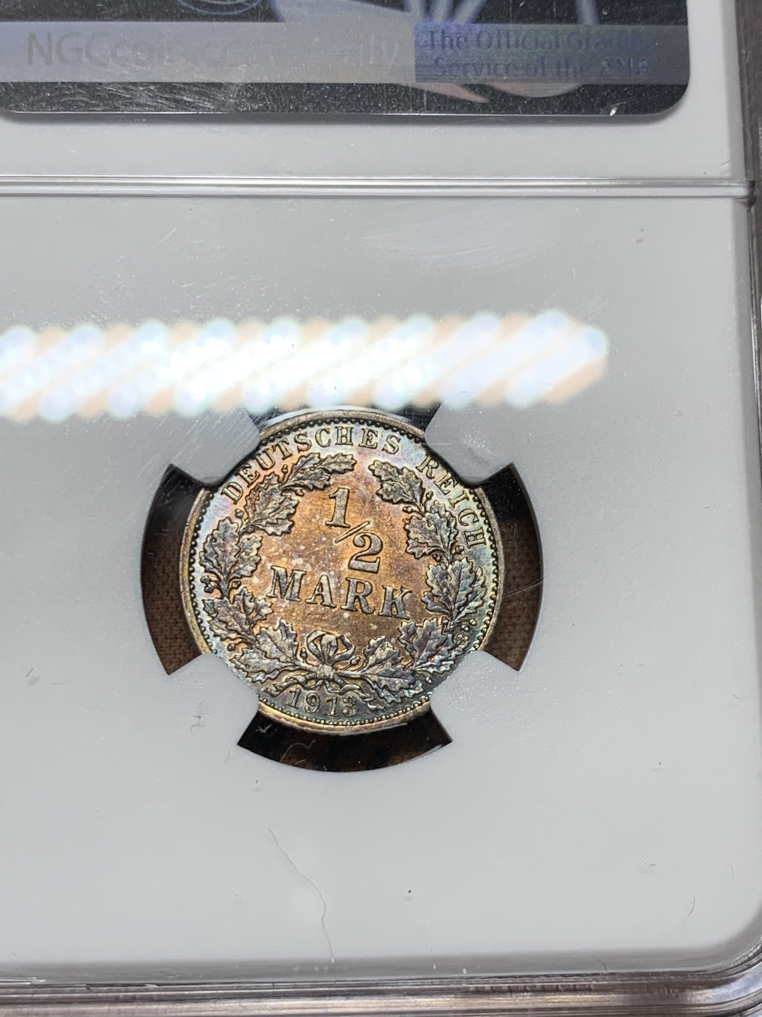 《竞宝斋》第38场-本周一 （全场顺丰包邮） NGC-MS61 德国 1916年 1/2马克 银币  双面五彩重彩包浆