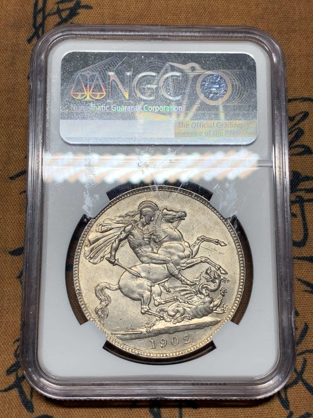 《竞宝斋》第38场-本周一 （全场顺丰包邮） NGC-62 英国1902爱德华七世一克朗，马剑大银币，爱七热门品种，转光很漂亮