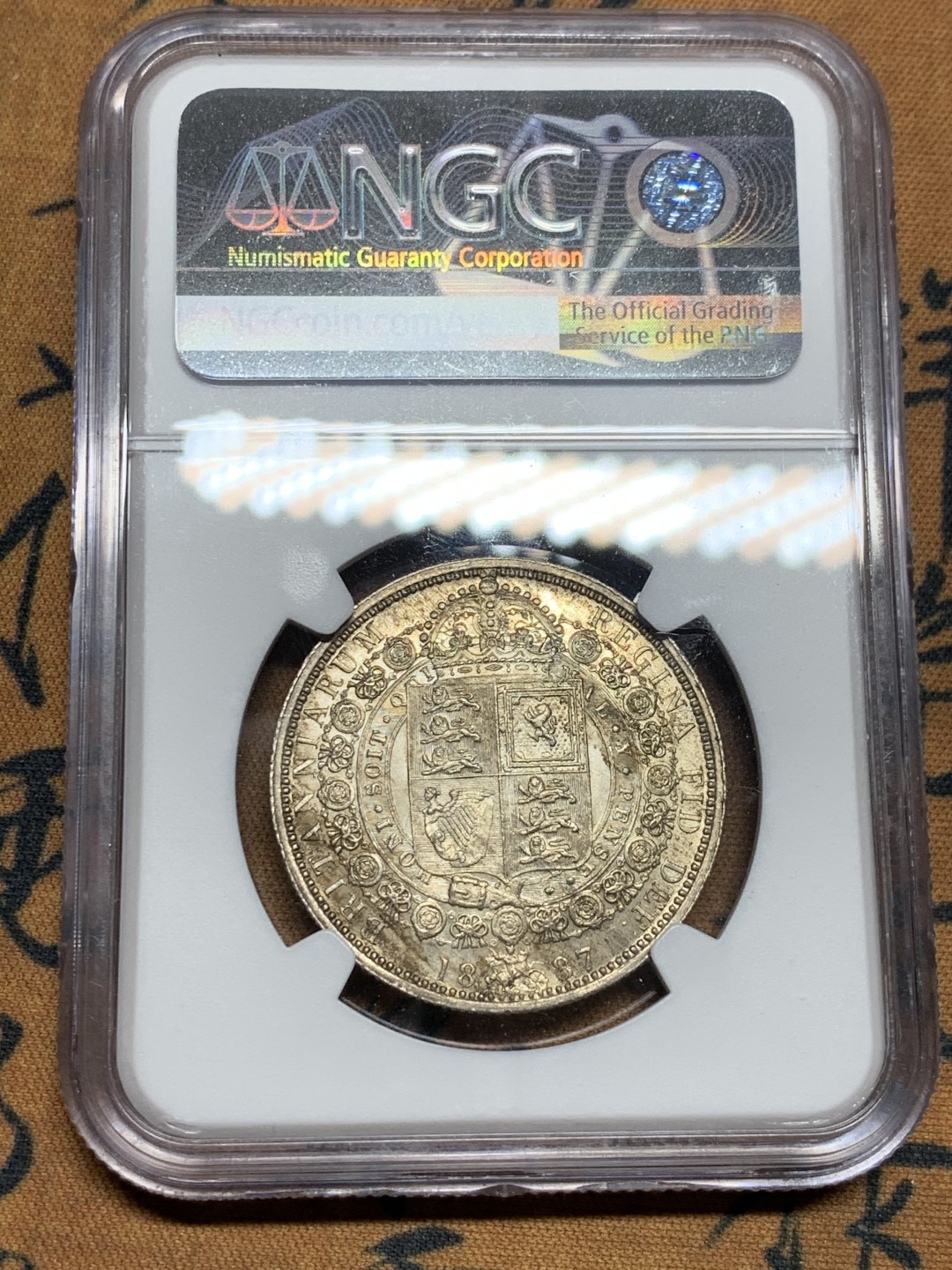 《竞宝斋》第38场-本周一 （全场顺丰包邮） NGC-MS62 英国 1887年1/2克朗高冠银币好品原味深包浆 持续上涨品种 