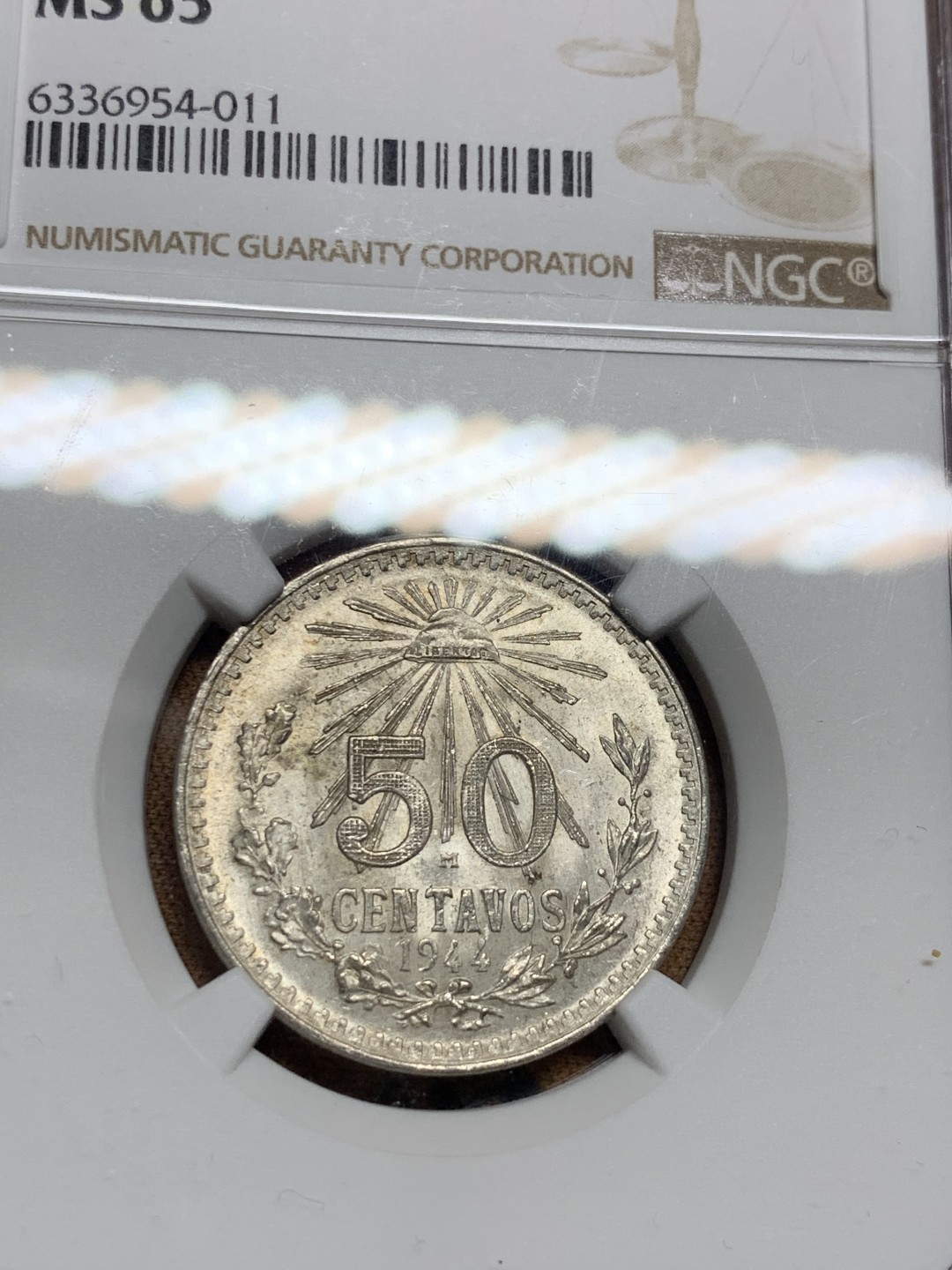 《竞宝斋》第38场-本周一 （全场顺丰包邮） ngc ms65 墨西哥1944年鹰洋银币一对