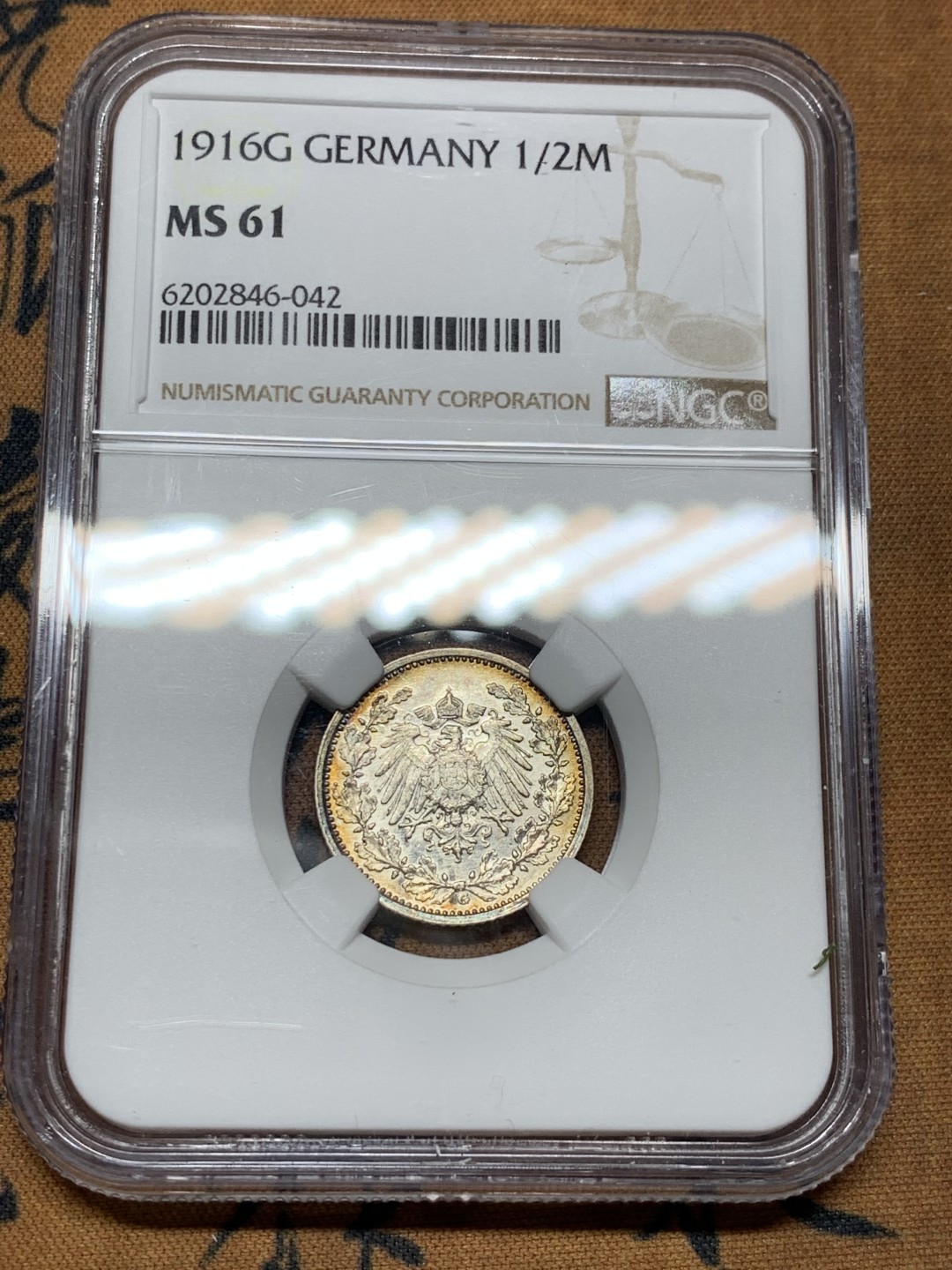 《竞宝斋》第38场-本周一 （全场顺丰包邮） NGC-MS61 德国 1916年 1/2马克 银币  双面五彩重彩包浆