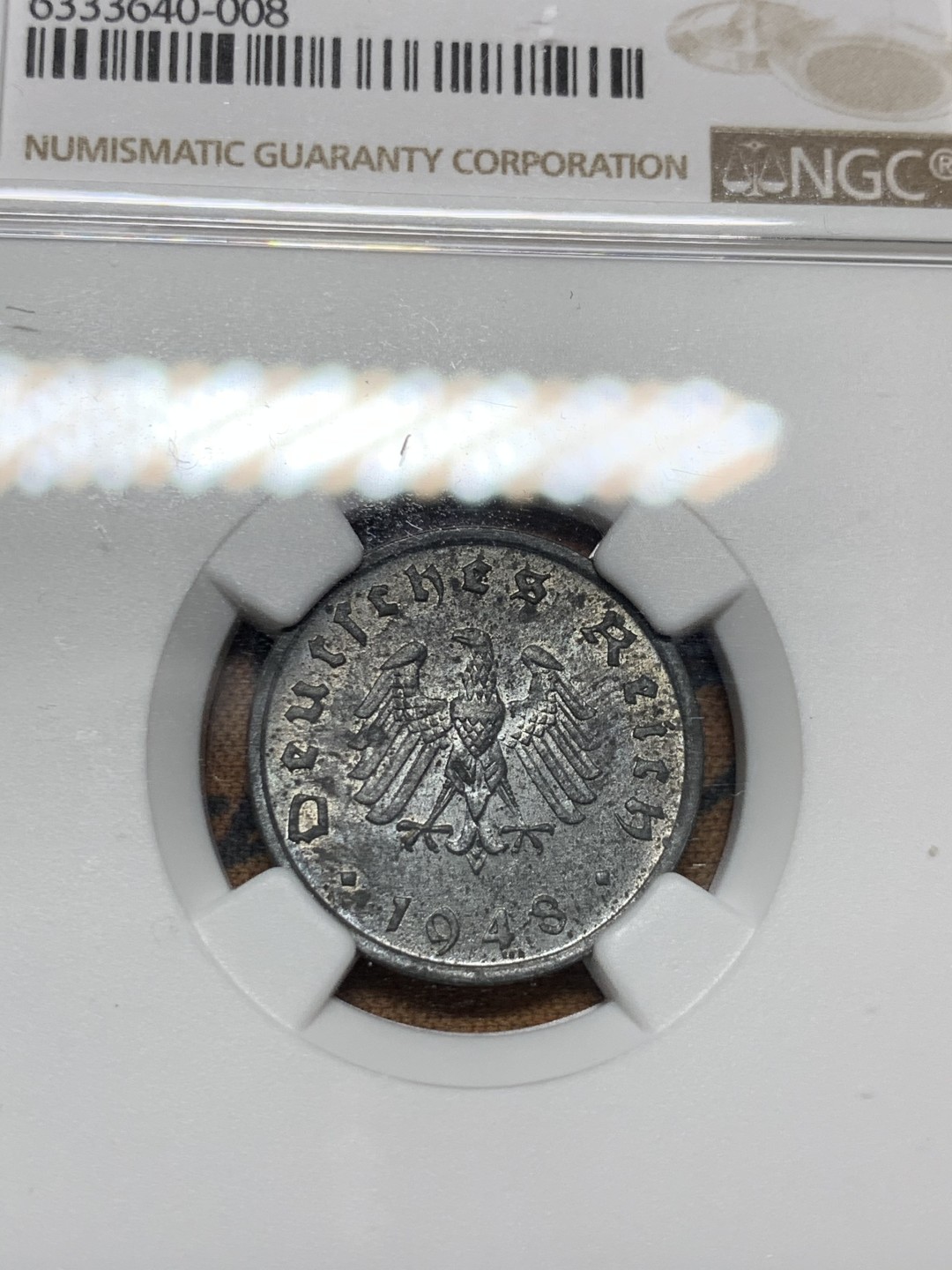 《竞宝斋》第38场-本周一 （全场顺丰包邮） NGC-MS62 盟军占德国 1948年F 10芬尼 拔毛鹰 锌币 锌币出分不易 完全未使用！