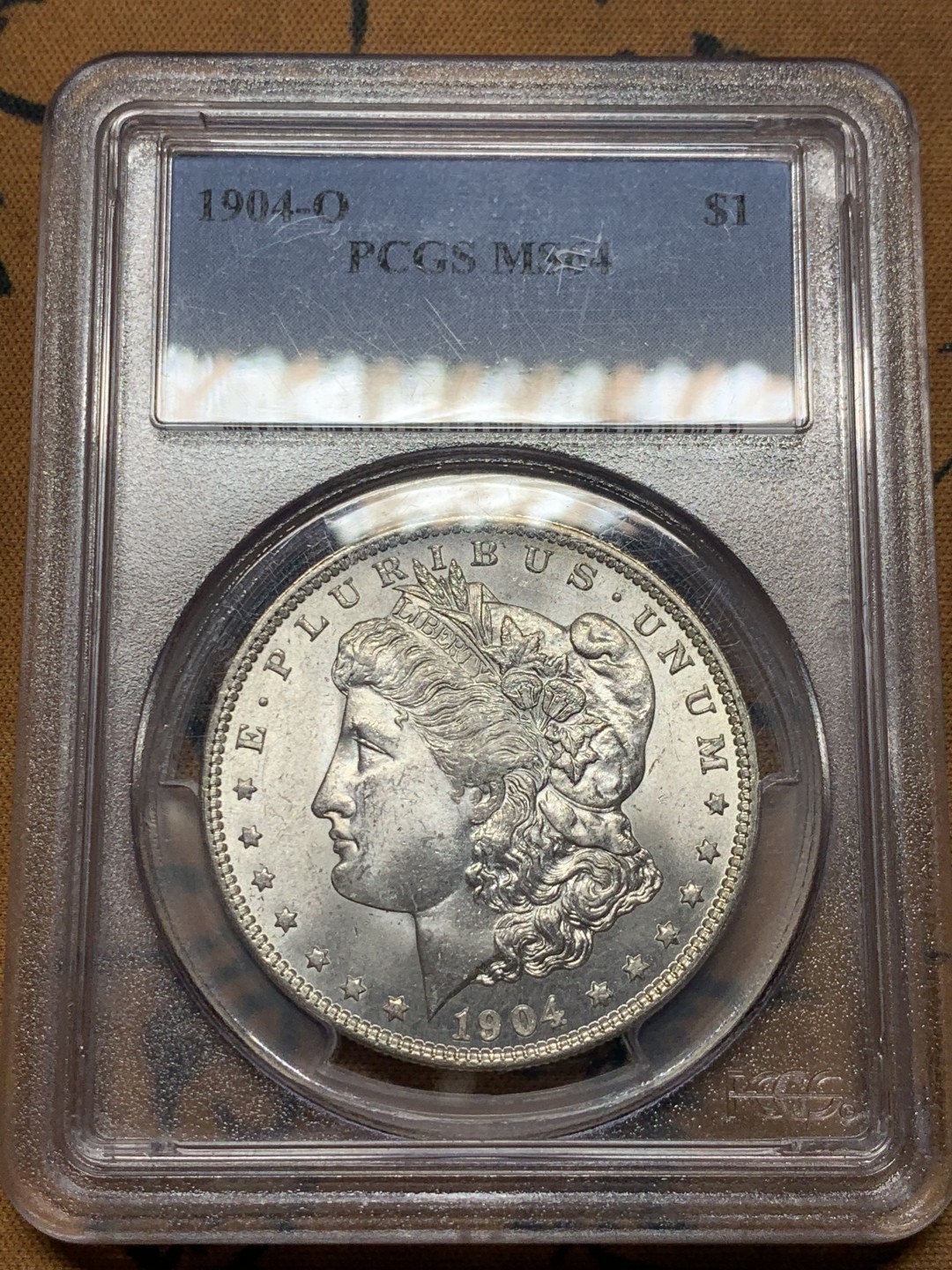 《竞宝斋》第38场-本周一 （全场顺丰包邮） PCGS-MS64 美国摩根银币1904-O 淡彩，脸不花，光度一流 少见小特年！除去1921的关门年份