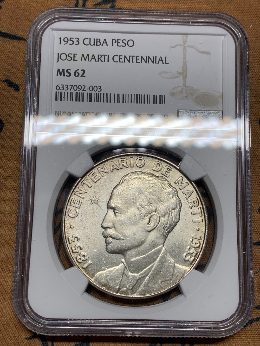《竞宝斋》第38场-本周一 （全场顺丰包邮） NGC-MS62 古巴 1953年 何塞马丁百年纪念 1比索 大银币 这币一般都满脸麻子 给分的难得