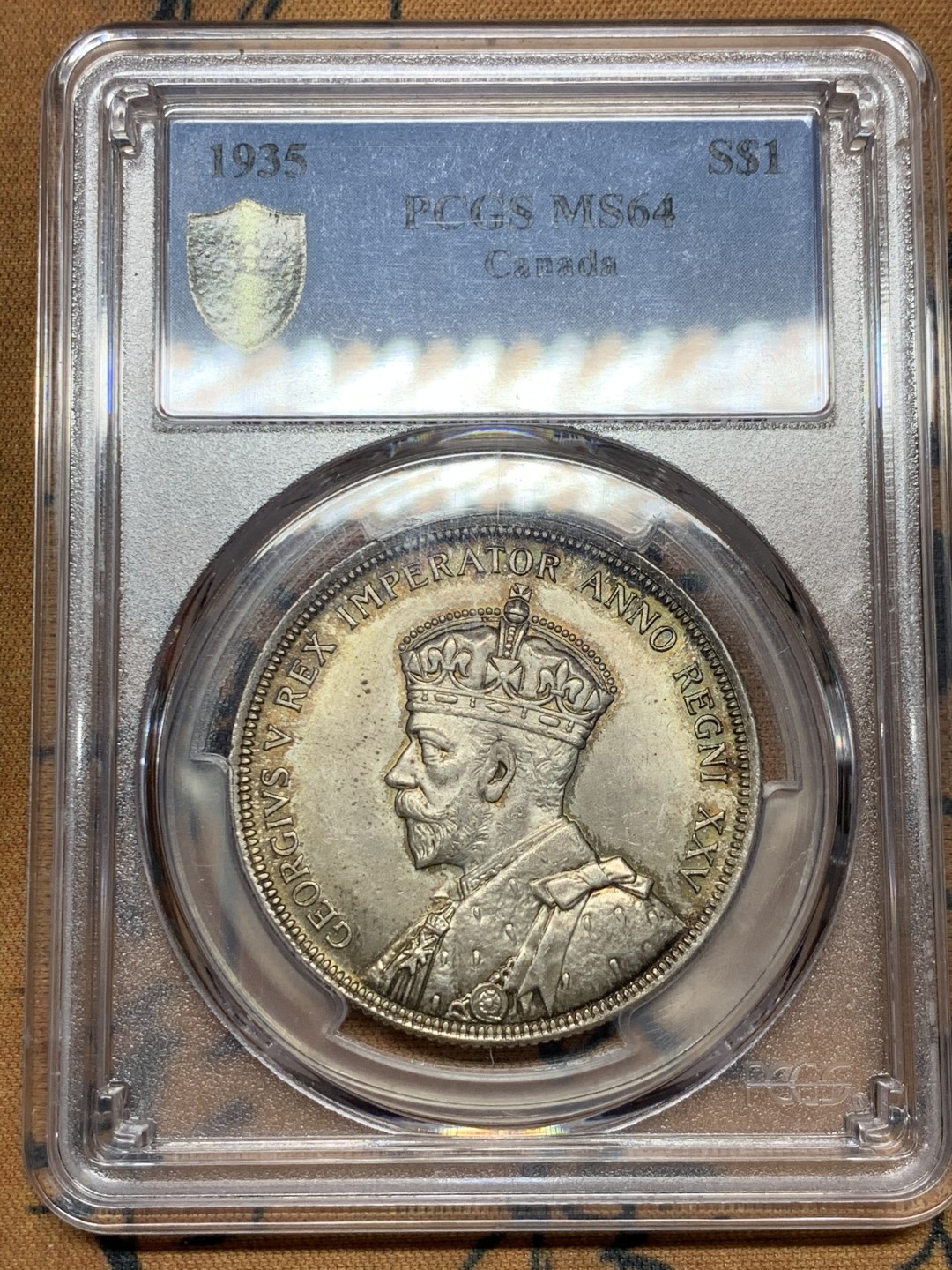 《竞宝斋》第38场-本周一 （全场顺丰包邮） PCGS MS-64 加拿大 1935年 1元大银币 乔治五世登基25周年纪念 历史上首枚划船，书价MS65 300美元，大涨品种，早期高分好品，转光老包浆！