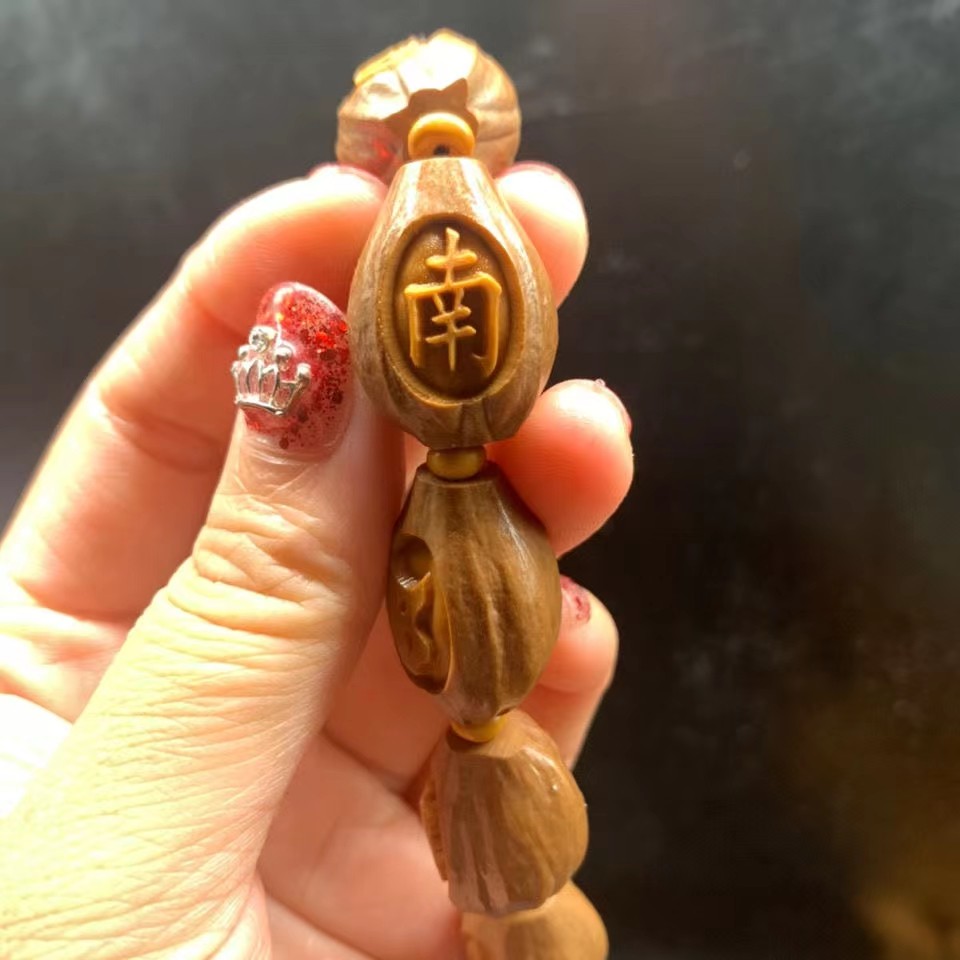 橄榄核六字真言手串橄榄胡核雕佛珠手链男女包衣铁核浮雕手持
