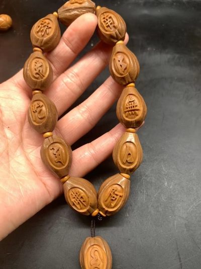 橄榄核六字真言手串橄榄胡核雕佛珠手链男女包衣铁核浮雕手持 - 橄榄核六字真言手串橄榄胡核雕佛珠手链男女包衣铁核浮雕手持