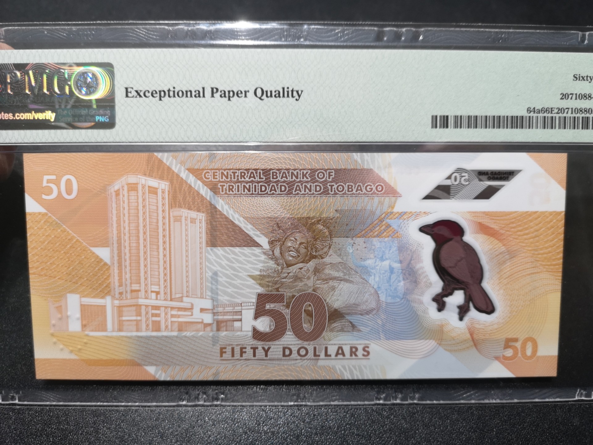 《外钞收藏家》第一百七十一期拍卖（本期97件） 2020年特里达尼亚和多巴哥50 AA冠 无47 PMG66