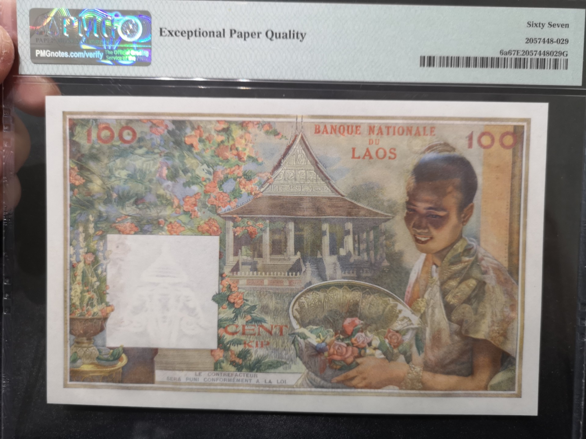 《外钞收藏家》第一百七十一期拍卖（本期97件） 1957年老挝100基辅 PMG67 猪哥