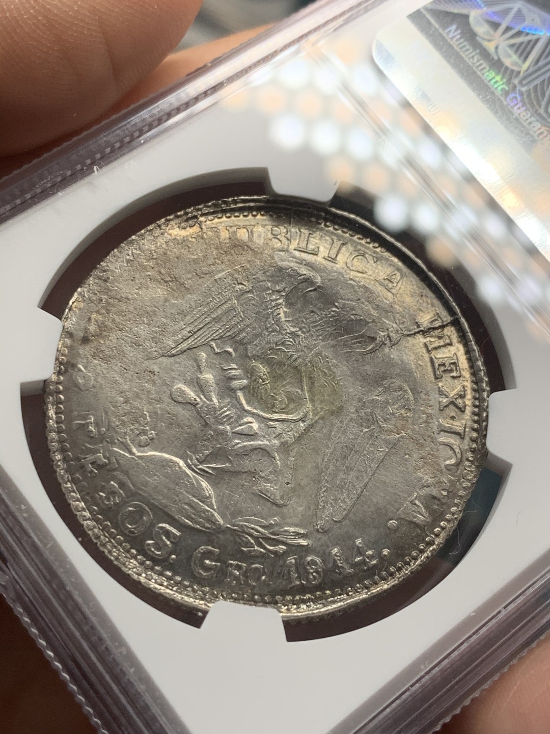 《竞宝斋》第39，40场-本周日，周一2场连拍（全场顺丰包邮） NGC-AU 墨西哥 1914年 革命 2比索 大银币 含少量金 ， XF品的裸币ebay成交价已经超过250美金了