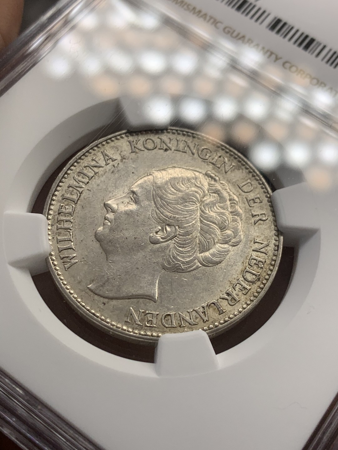 《竞宝斋》第39，40场-本周日，周一2场连拍（全场顺丰包邮） NGC 评级 荷兰1940年 威廉明娜 1G 银币 底光状态